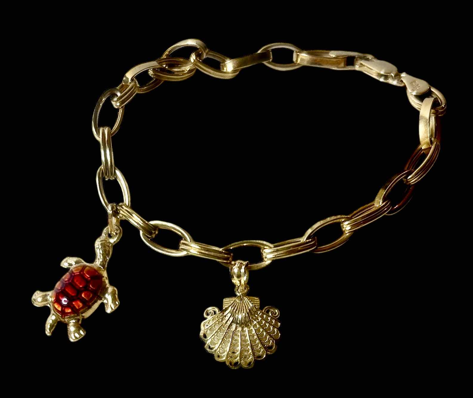 Photo 1 of 14K GOLD BRACELET AND CHARMS