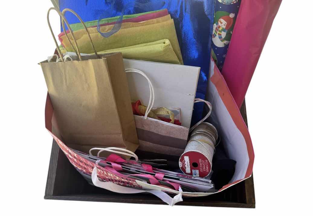 Photo 2 of WOODEN CRATE WITH ASSORTED WRAPPING SUPPLIES, GIFT BAGS, RIBBONS, STREAMERS 

WOODEN CRATE 
18” X 12.5” X H9.5”