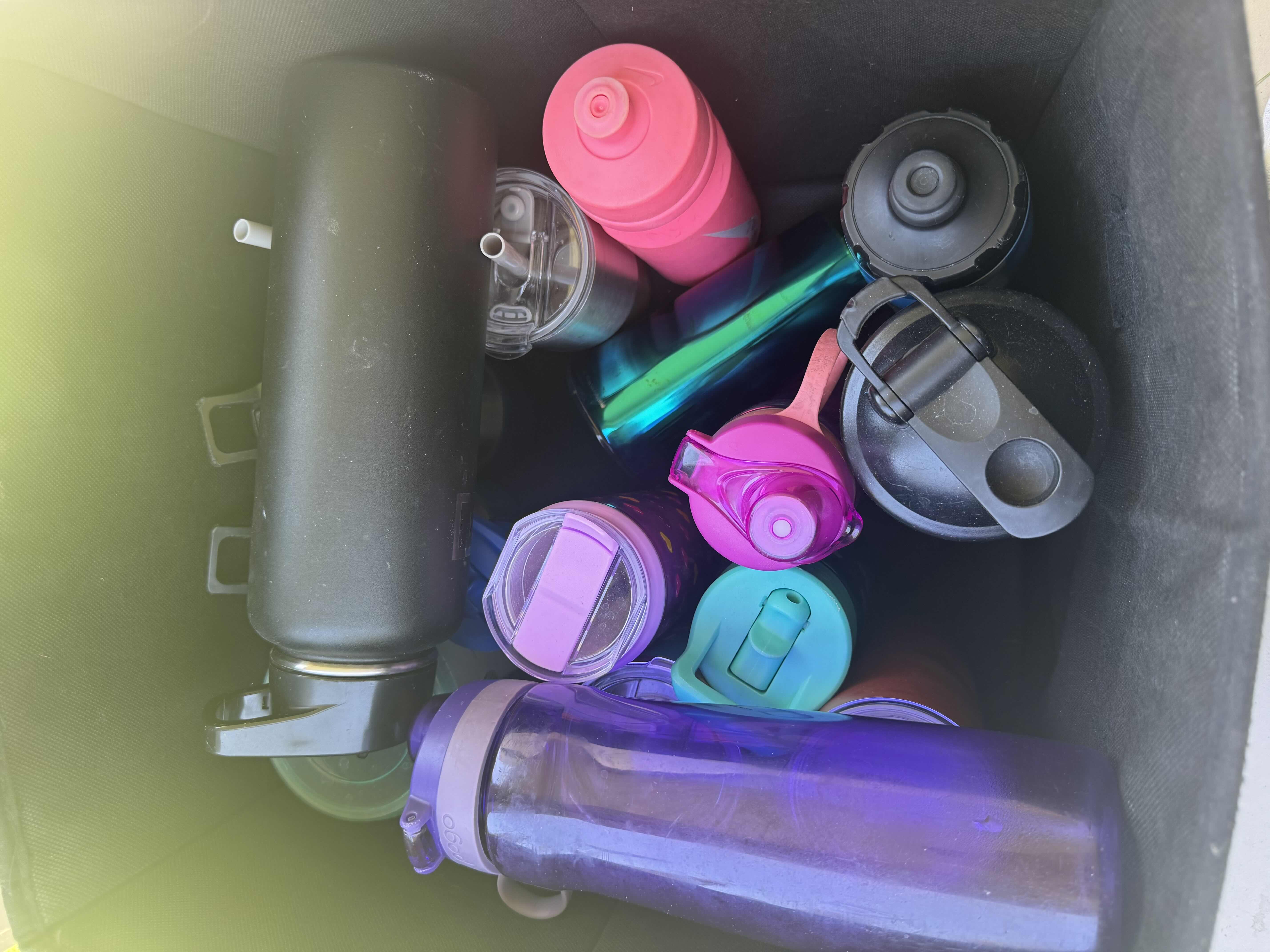 Photo 2 of BLACK TOTE WITH ASSORTED BOTTLES AND TUMBLERS, 18 PIECES

TOTE 
14.5” X 12.5” H12.5”