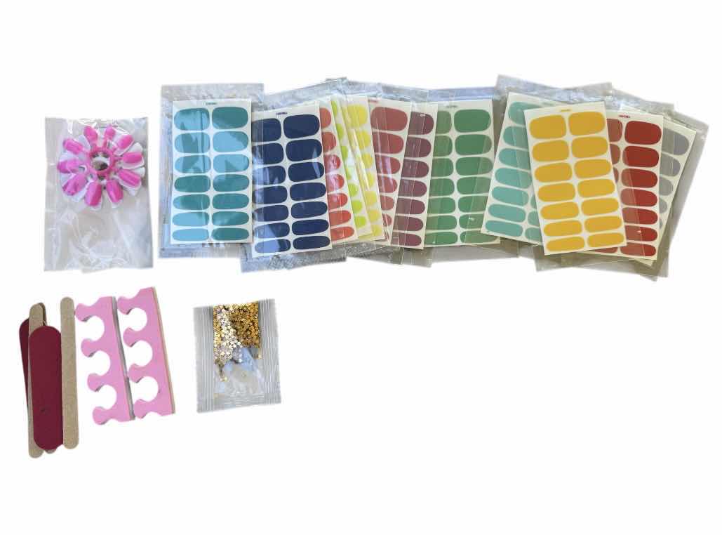 Photo 1 of BLACK TRAVEL BAG WITH NAIL POLISH, NAIL FILES, TOE SEPARATOR, FAKE NAILS