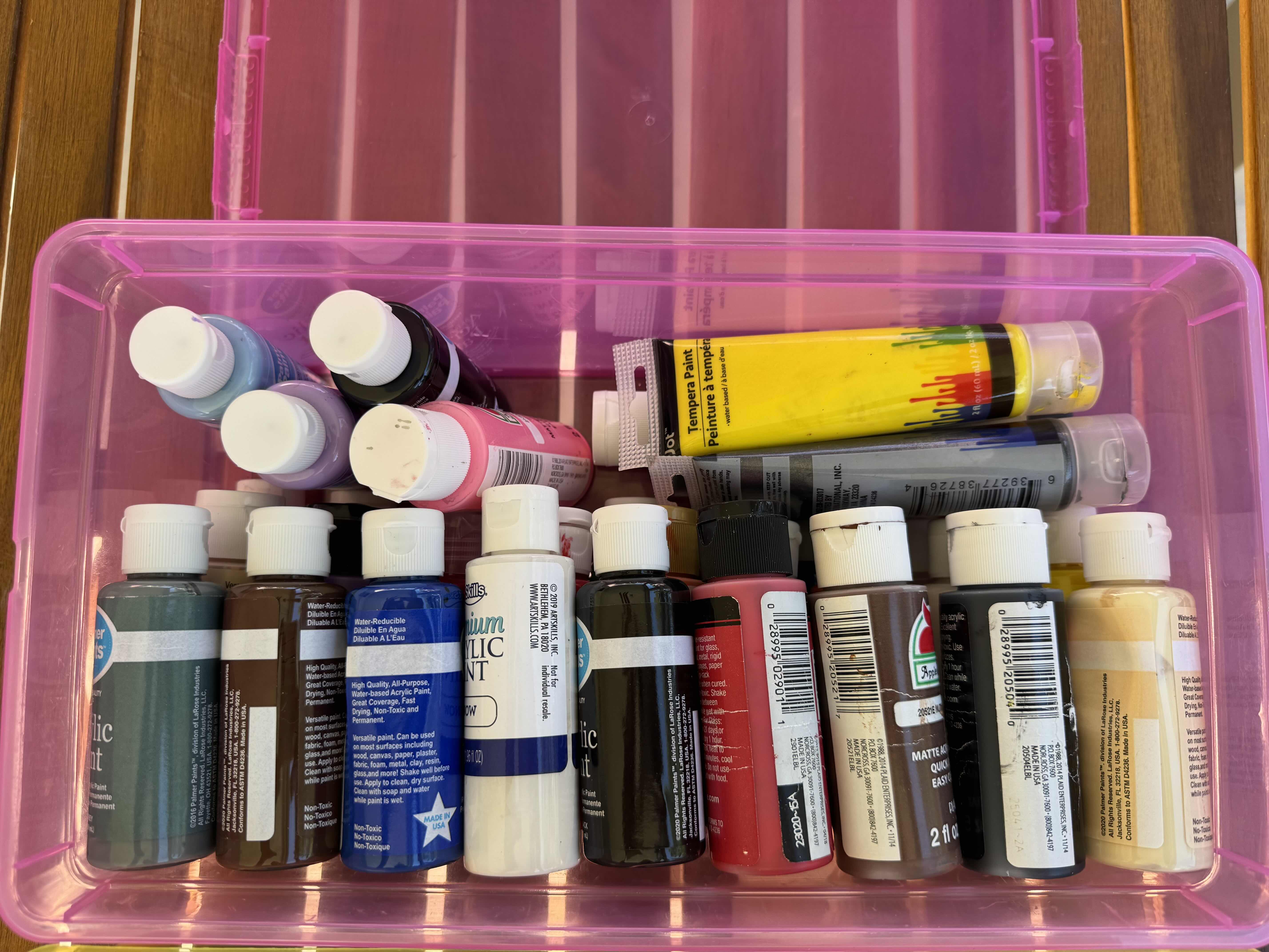 Photo 1 of 2 TOTES OF ART SUPPLIES, ACRYLIC PAINT, WINDOW PAINT, PAINT STICKS, SILICONE PAINTING MATS, PAINT CUPS, SILICONE CUPS FOR PAINT, 

TOTES
13” X 7.5” X H4.5”