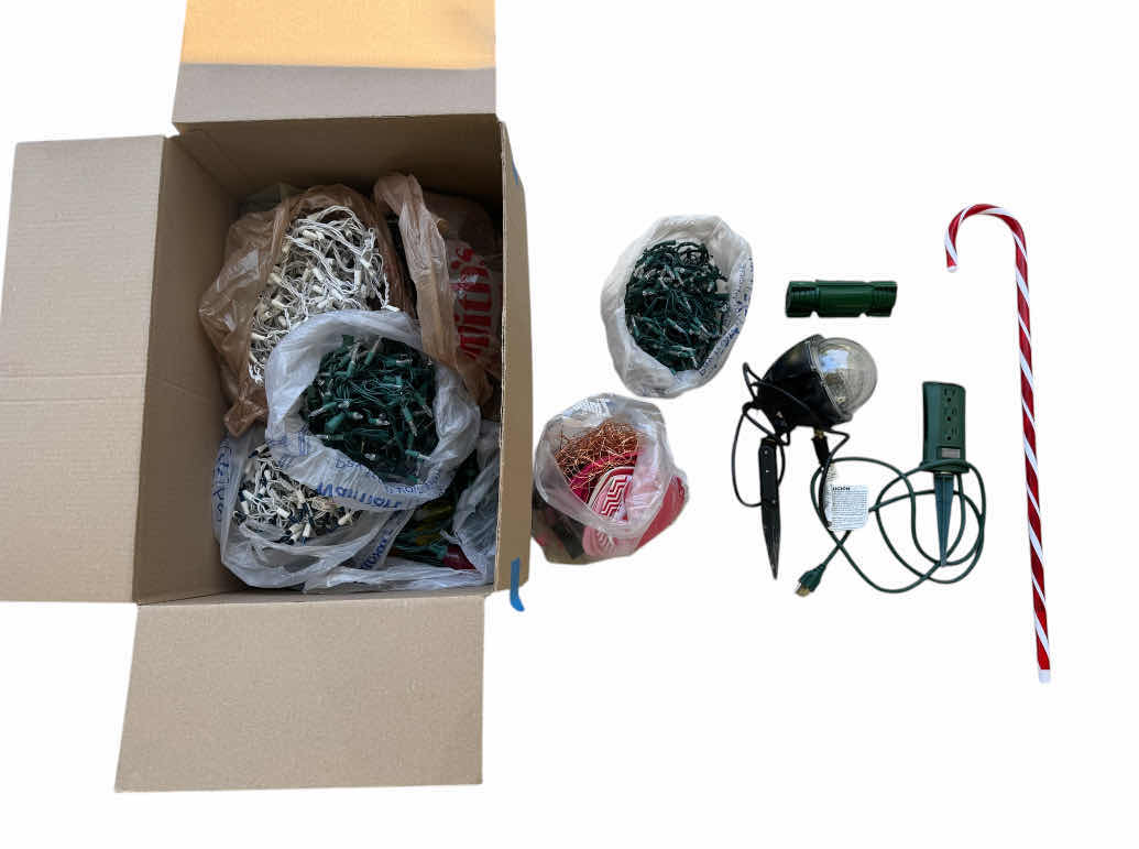 Photo 1 of HOLIDAY DECOR, HOLIDAY LIGHTS, OUTDOOR/INDOOR, INFLATABLE DECOR, EXTENSION CORD, OUTDOOR LIGHT, CORD PROTECTOR, HOLIDAY FIGURINES, DECORATIVE CANDY CANE