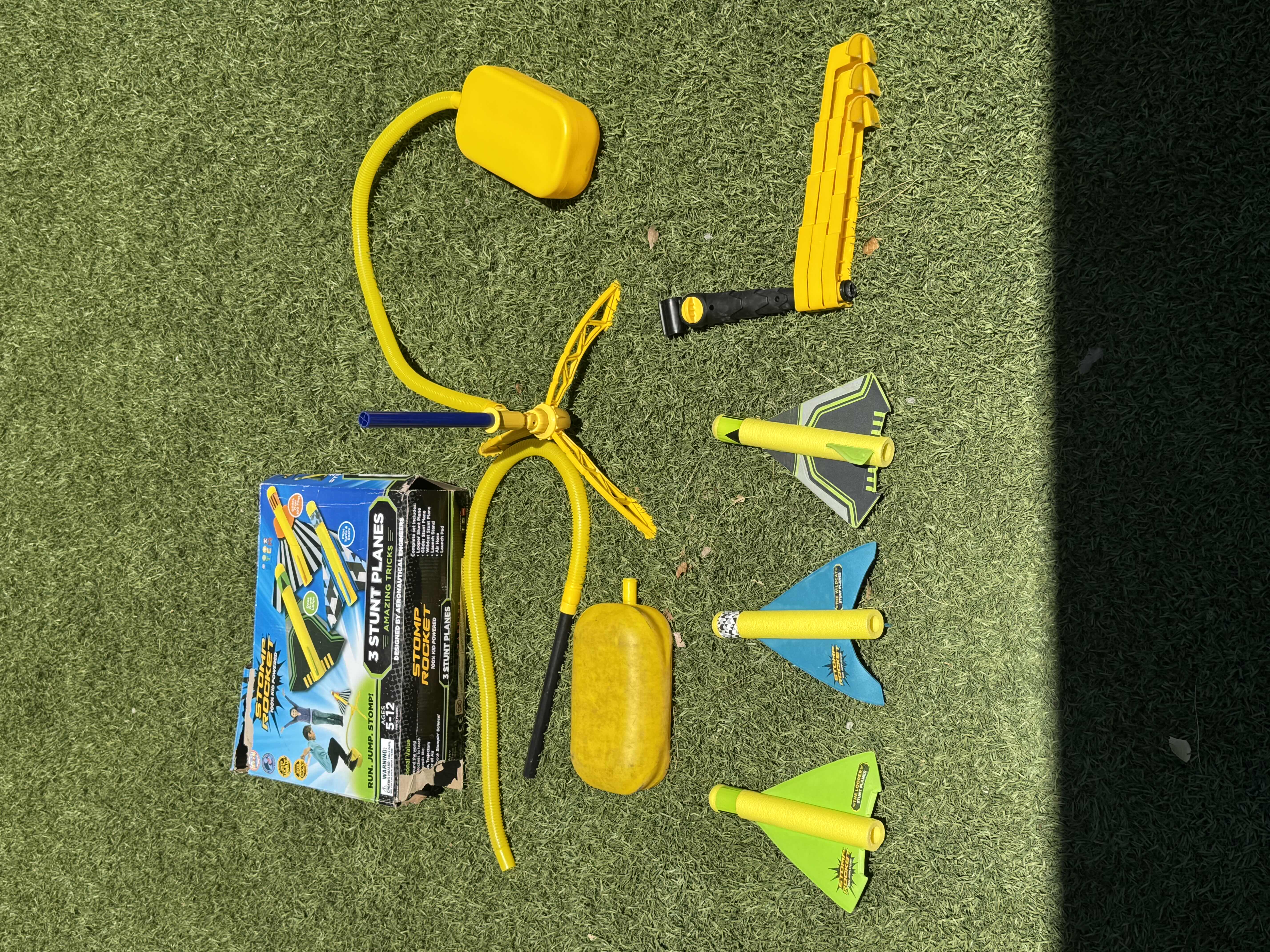 Photo 1 of TOTE OF OUTDOOR ACTIVITIES, KIDS GAMES ACTIVITIES, STOMP ROCKETS, JUMP AND SQUEAK, NERF FOOTBALL, NEON HEEL SKATES, WIFFLE PLASTIC PRACTICE GOLF BALLS, GOLF BALLS, SNOWBALL MAKERS

TOTE 
15” X 13” X H13”