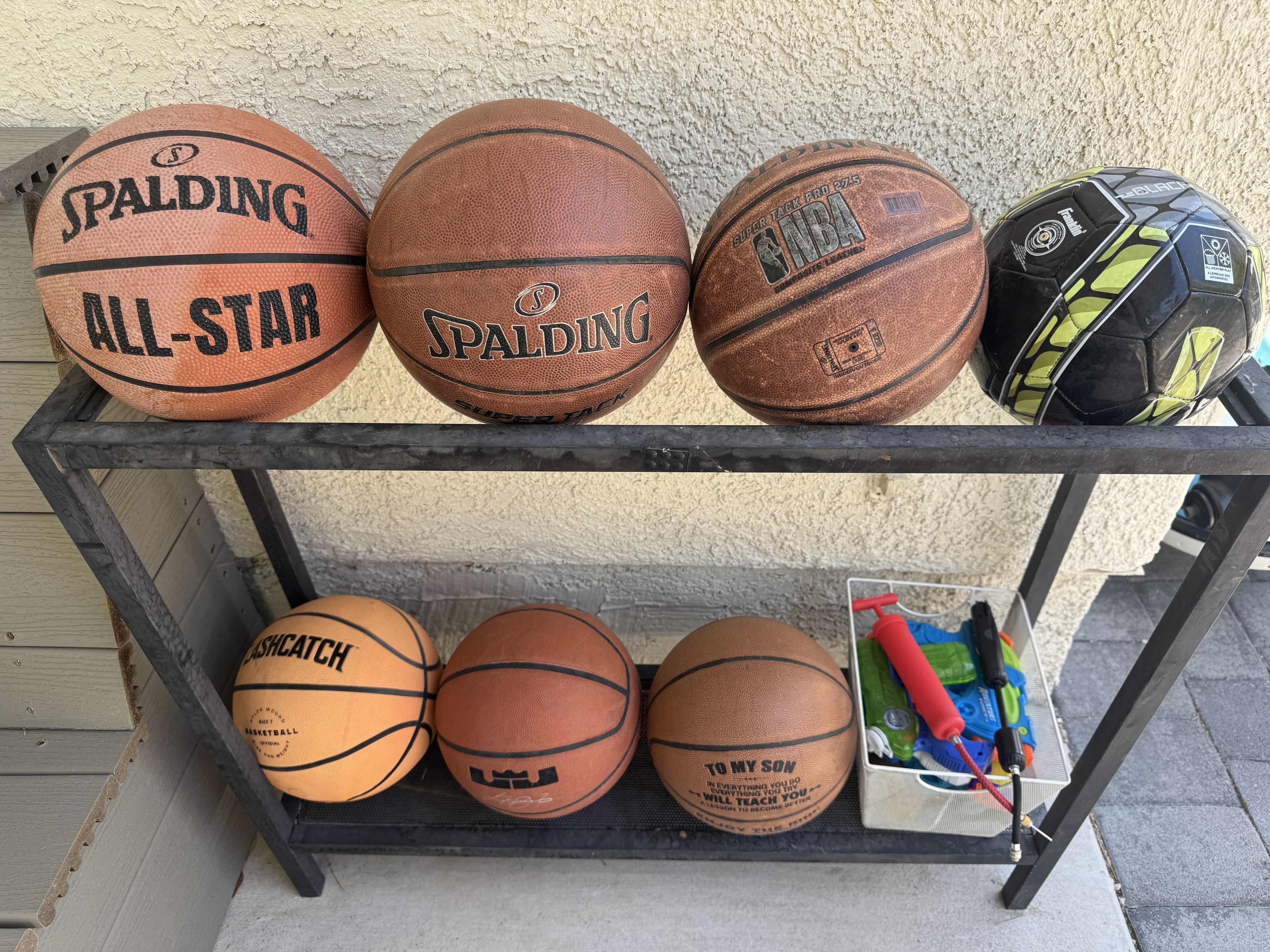 Photo 2 of BALLRACK, BASKETBALL SOCCER BALL RACK, 3 AIR PUMPS/INFLATION PUMPS, WATER GUNS, OUTDOOR ACTIVITIES, BALL STORAGE ORGANIZER

36” X 10” X H30”