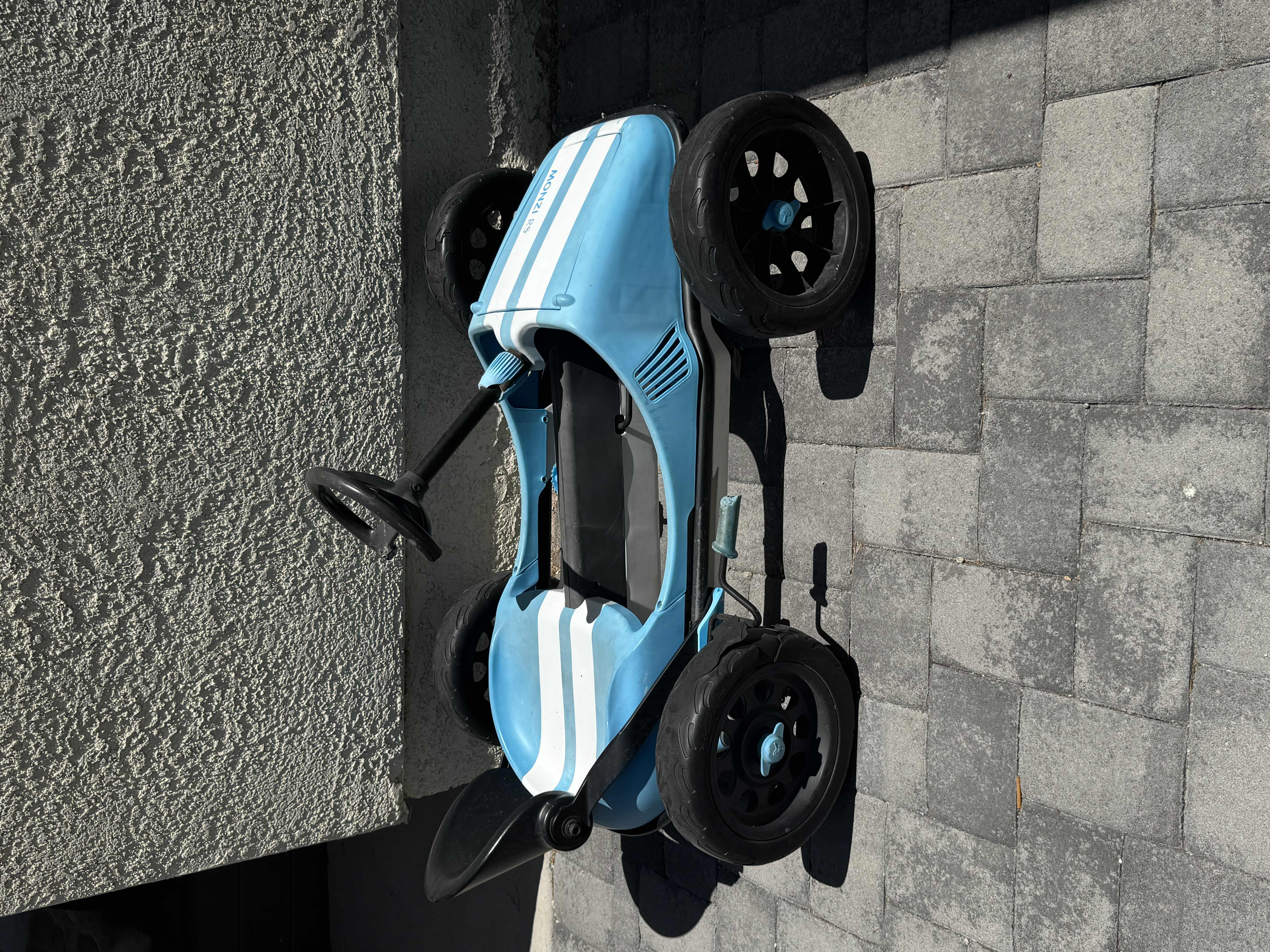 Photo 1 of BLUE MONZI RS KIDS PEDAL GO KART

44” X 29” X H26”