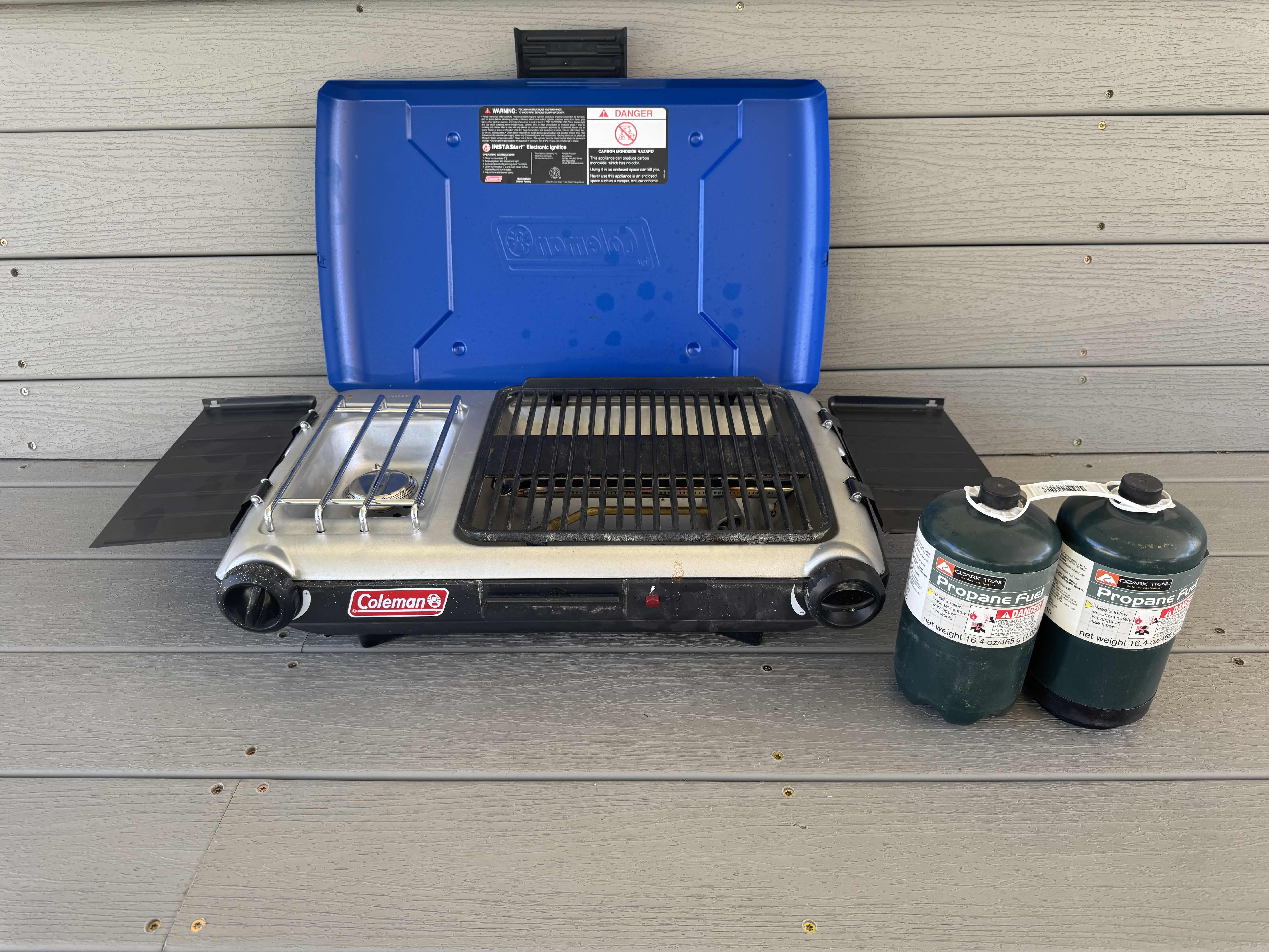 Photo 3 of COLEMAN BURNER PROPANE GRILL STOVE AND 2 PROPANE 16.4OZ TANKS, OUTDOOR, PORTABLE, BLUE

22” X 14.5” X H5.5”