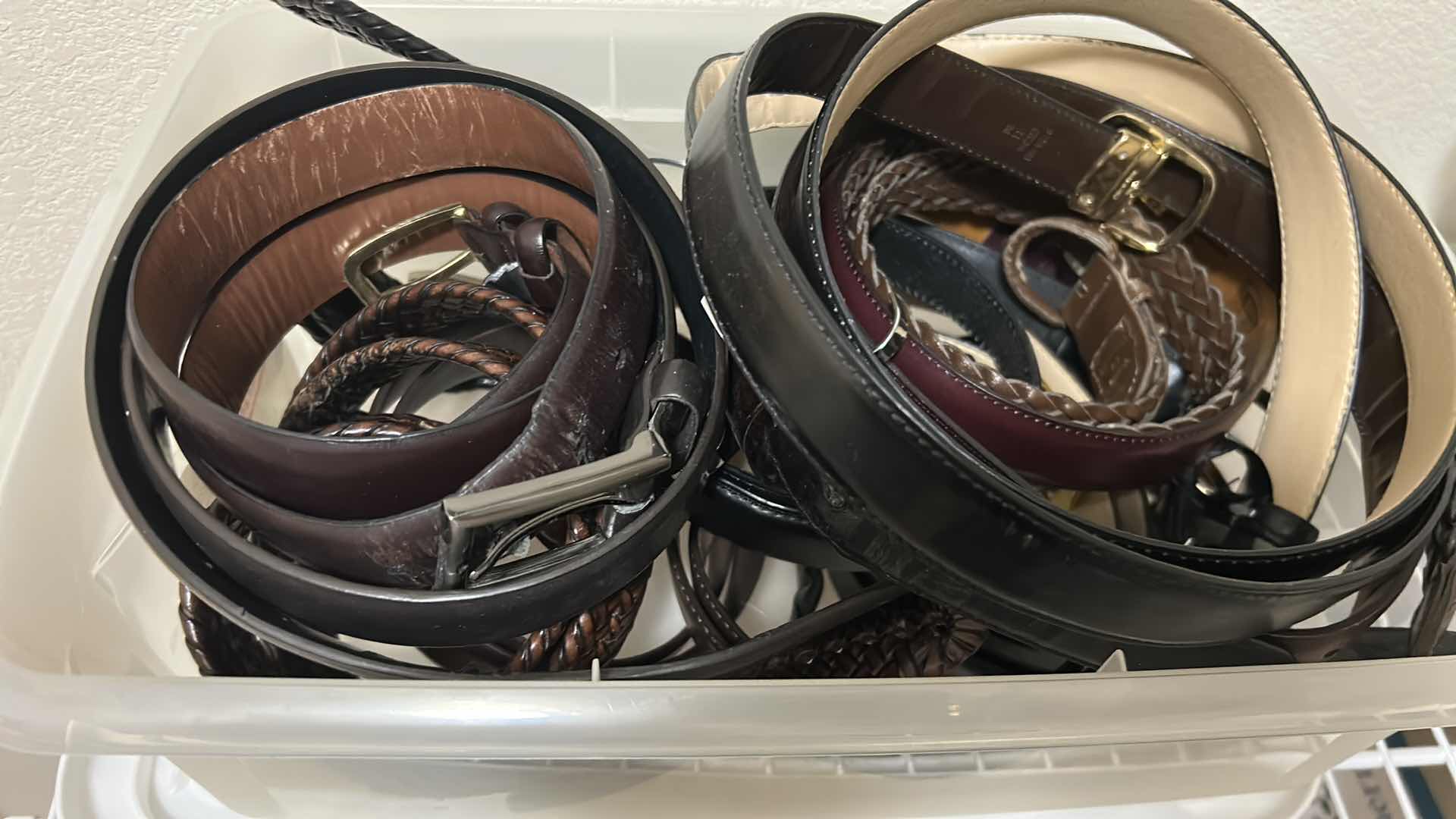 Photo 1 of CONTENTS OF CONTAINER MENS ASSORTED BELTS SIZE 38