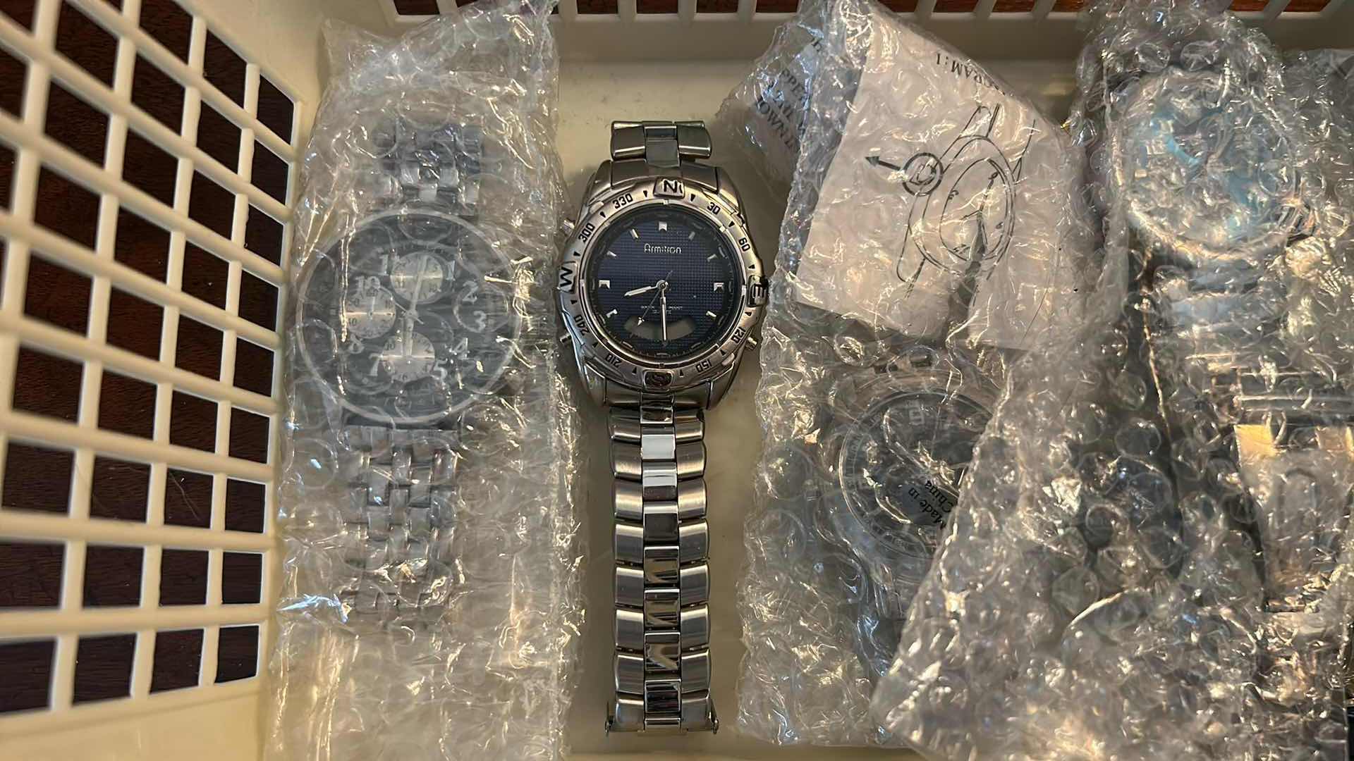 Photo 2 of CONTENTS OF BASKET ASSORTED WATCHS