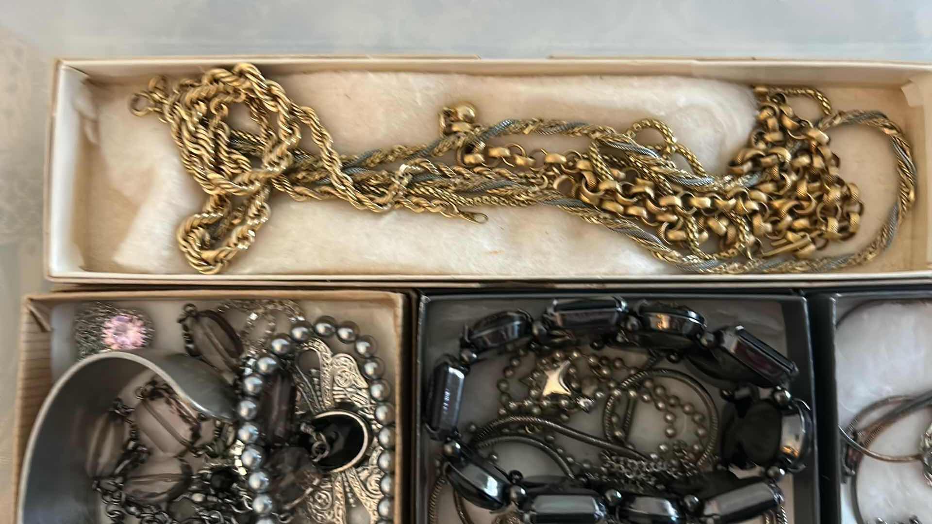 Photo 1 of CONTENTS OF CONTAINER ASSORTED WOMENS COSTUME JEWELRY