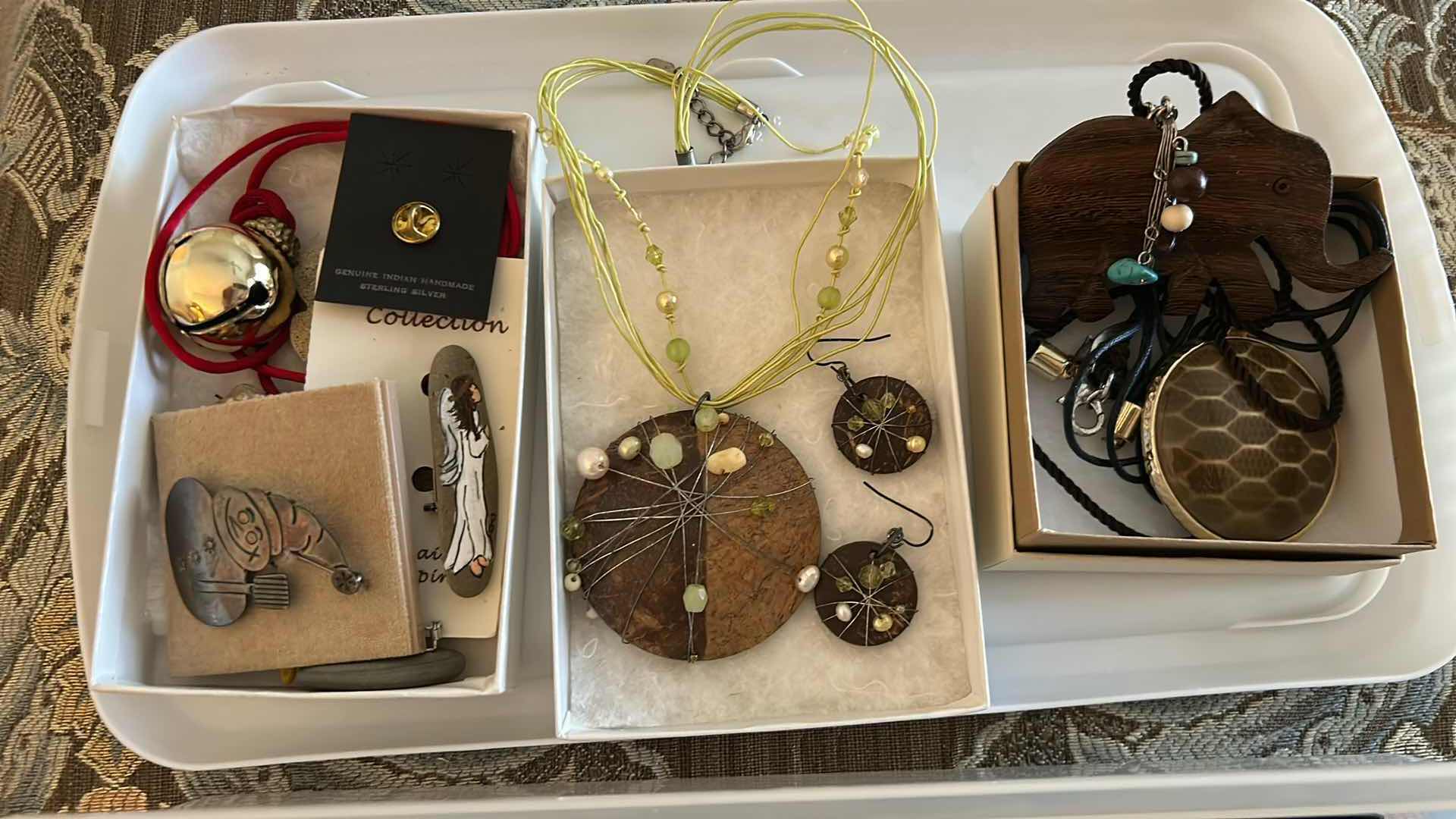 Photo 1 of CONTENTS OF CONTAINER ASSORTED WOMENS COSTUME JEWELRY