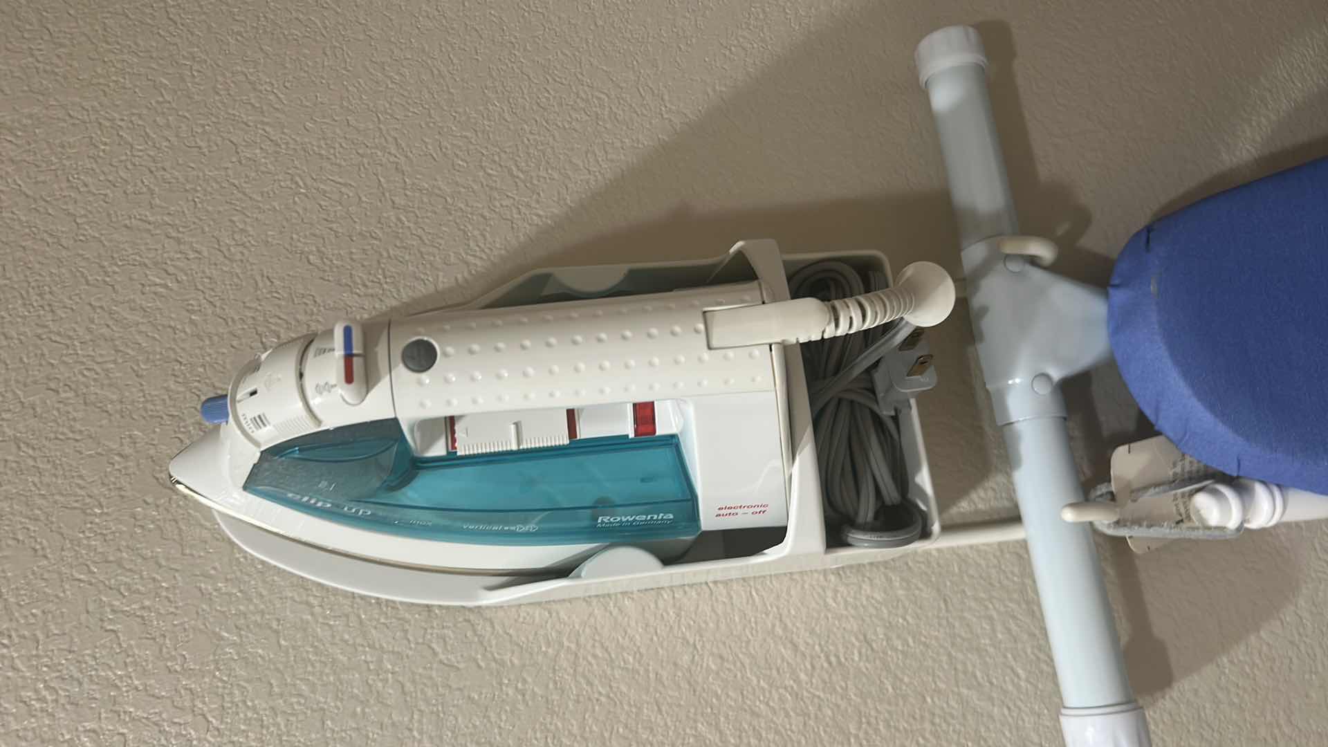Photo 1 of ROWENTA IRON AND IRONING BOARD