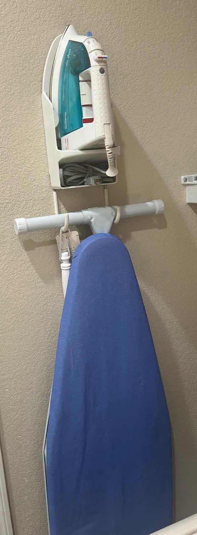 Photo 1 of ROWENTA IRON AND IRONING BOARD