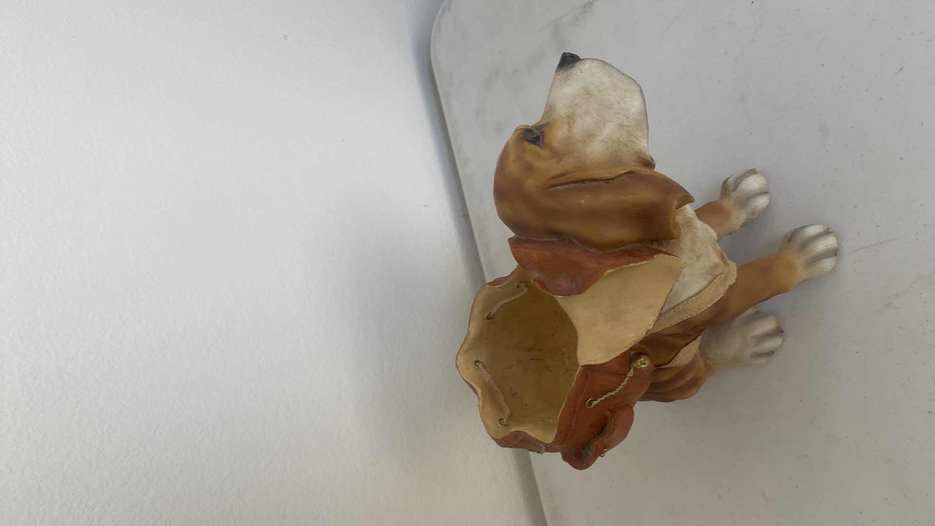 Photo 1 of RESIN DOG WITH BASKET FIGURINE 10” x 8”