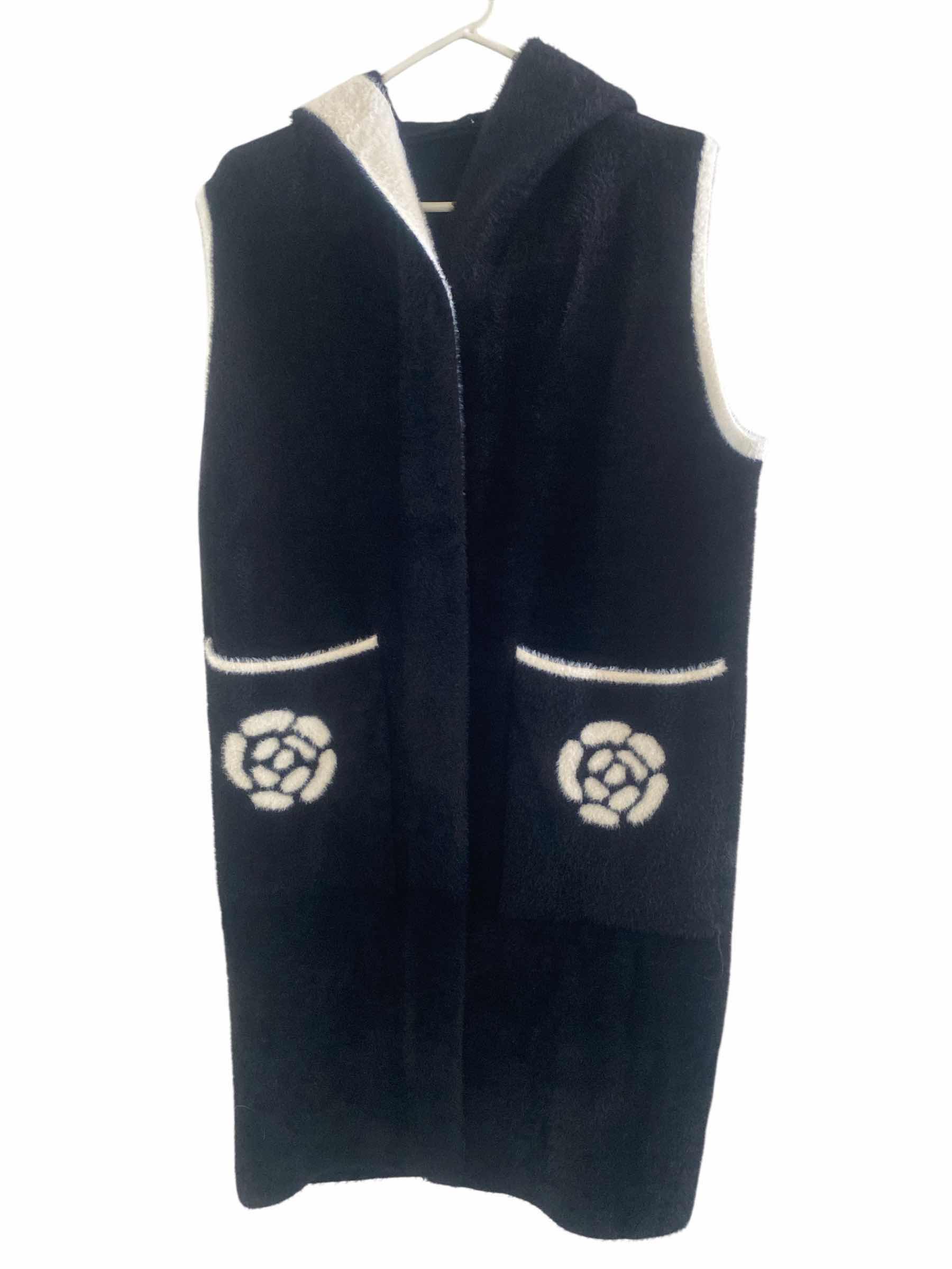 Photo 1 of WOMENS EST SIZE MEDIUM LONG HOODED VEST