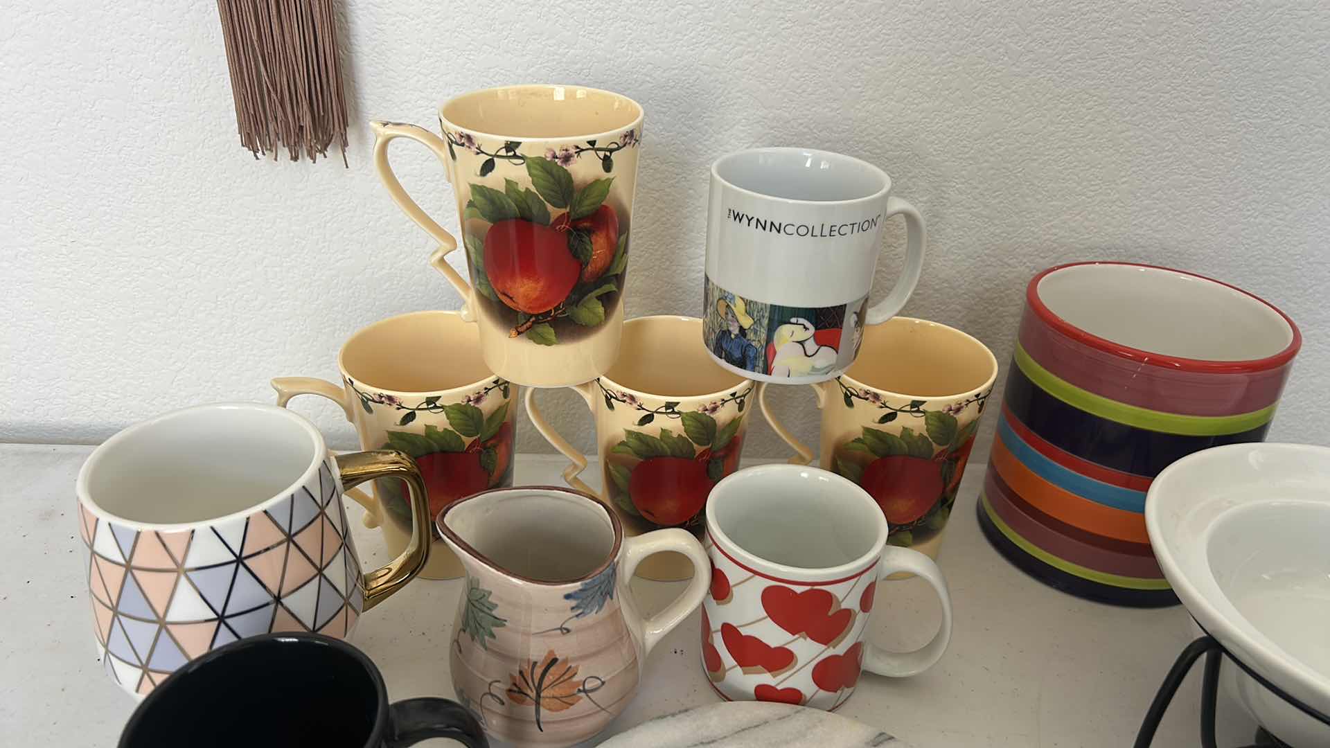 Photo 1 of KITCHEN / ENTERTAINMENT/ SERVING ITEMS- COFFEE MUGS , WINE HOLDER, TRIVIT AND MORE