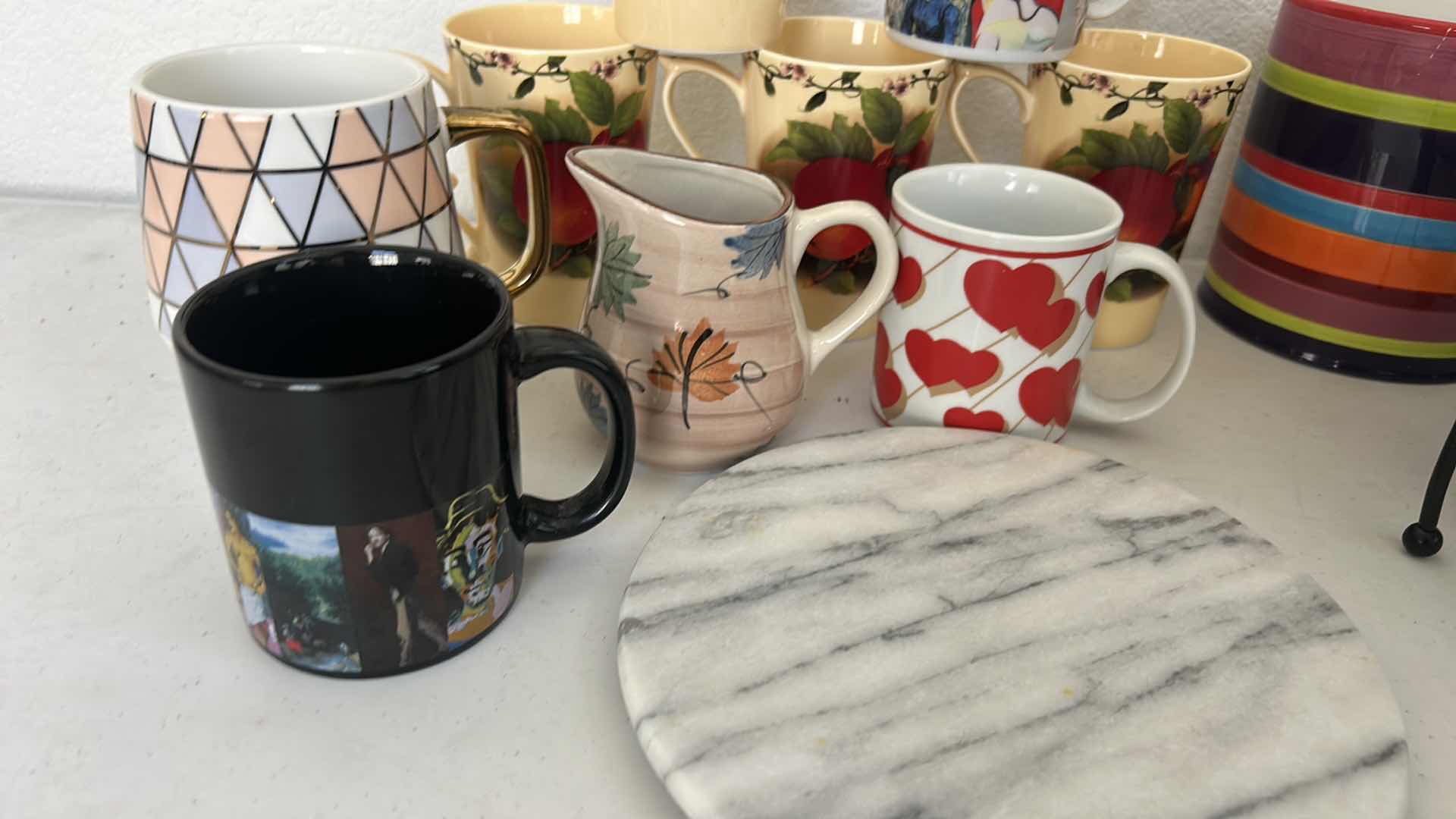 Photo 1 of KITCHEN / ENTERTAINMENT/ SERVING ITEMS- COFFEE MUGS , WINE HOLDER, TRIVIT AND MORE