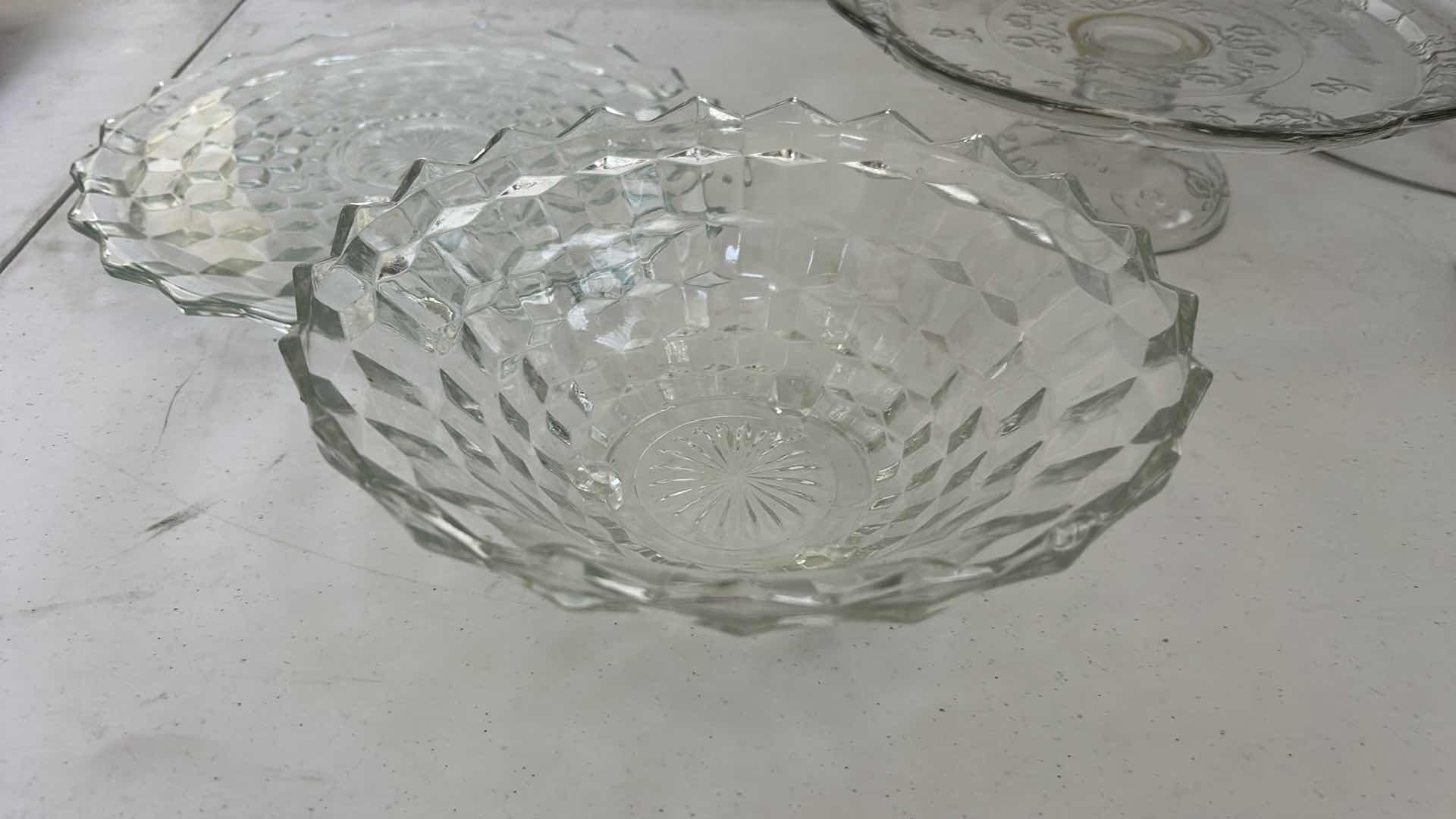 Photo 1 of GLASS CRYSTAL ASSORTMENT- CAKE STAND WITH LID, BOWL, PLATTER