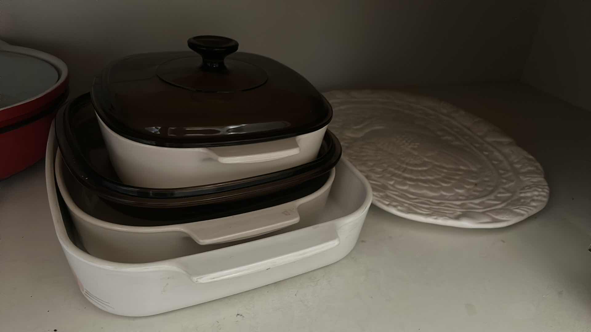 Photo 1 of CONTENTS OF KITCHEN CABINET