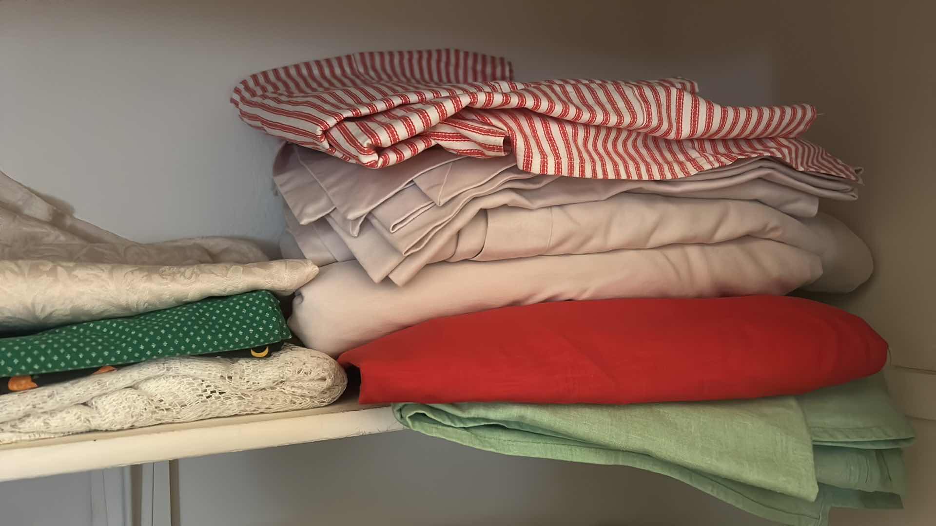 Photo 1 of 2 SHELFS OF LINEN, PLACEMATS, HAND TOWELS AND MORE