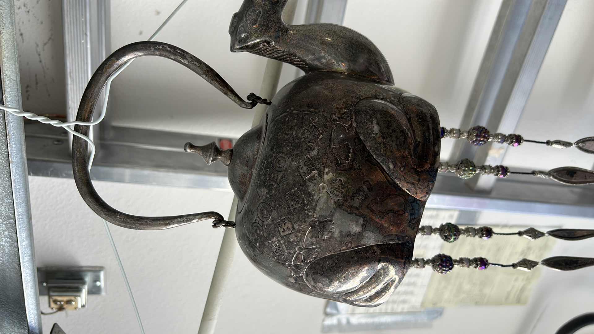 Photo 1 of HEAVY METAL CAMEL TEAPOT WINDCHIME