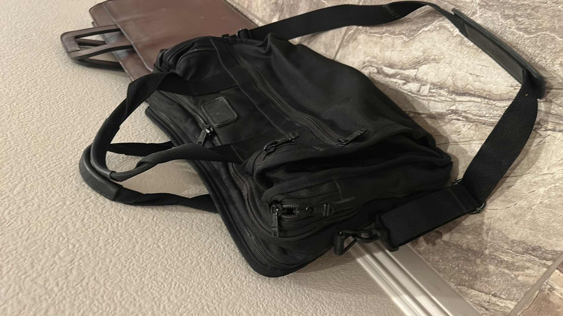 Photo 1 of 2 MENS CARRYING CASES