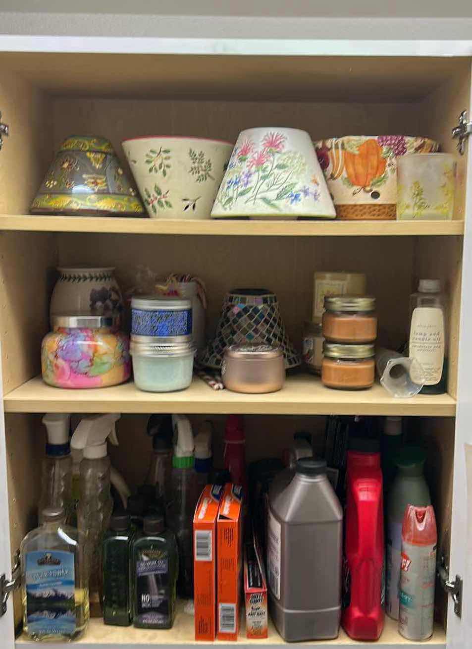 Photo 1 of LAUNDRY ROOM CABINET - CLEANING SUPPLIES AND CANDLES