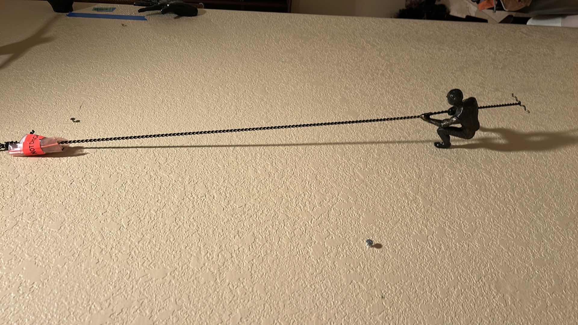 Photo 1 of 42” METAL WALL SCULPTURE “CLIMBING MAN”