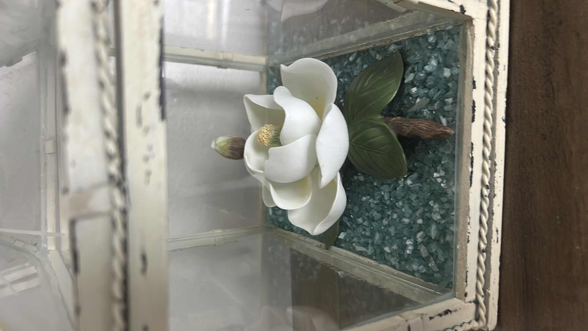 Photo 1 of GLASS AND METAL TERRARIUM H12” &  PORCELAIN MAGNOLIA FIGURINE.