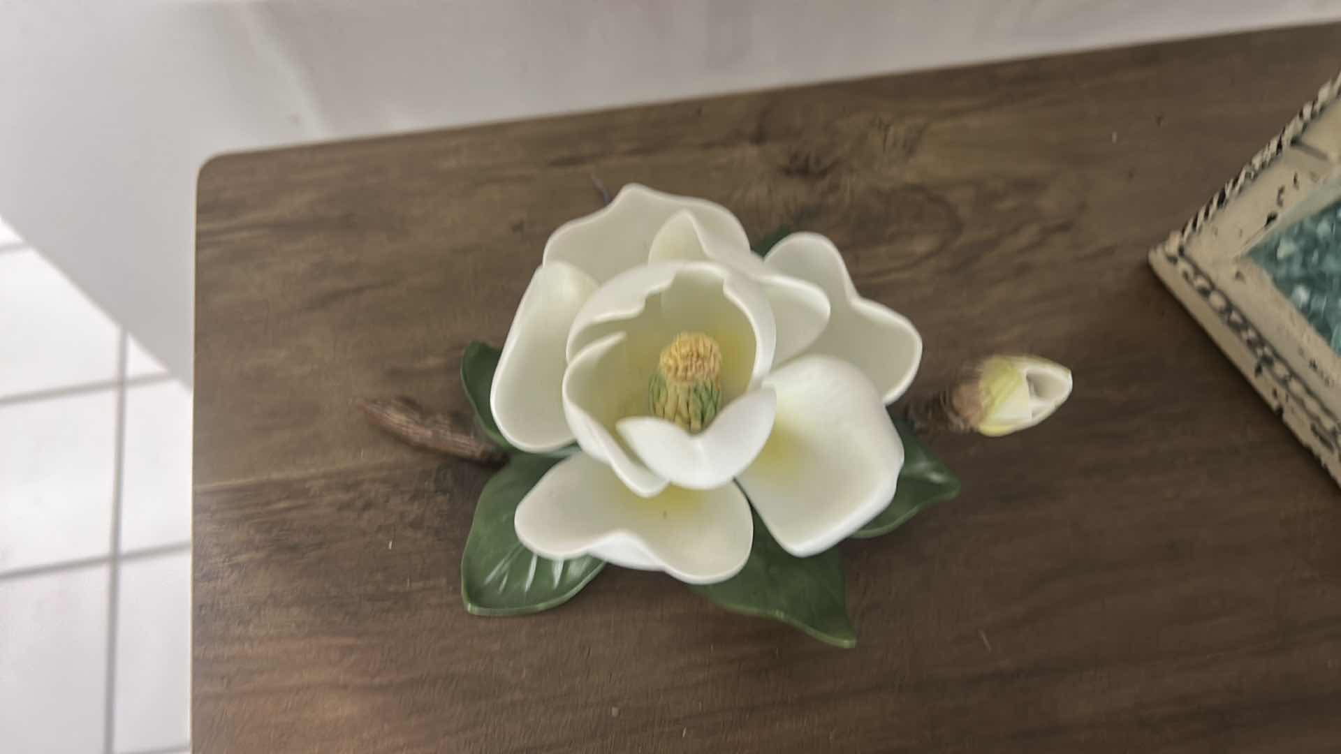 Photo 1 of GLASS AND METAL TERRARIUM H12” &  PORCELAIN MAGNOLIA FIGURINE.