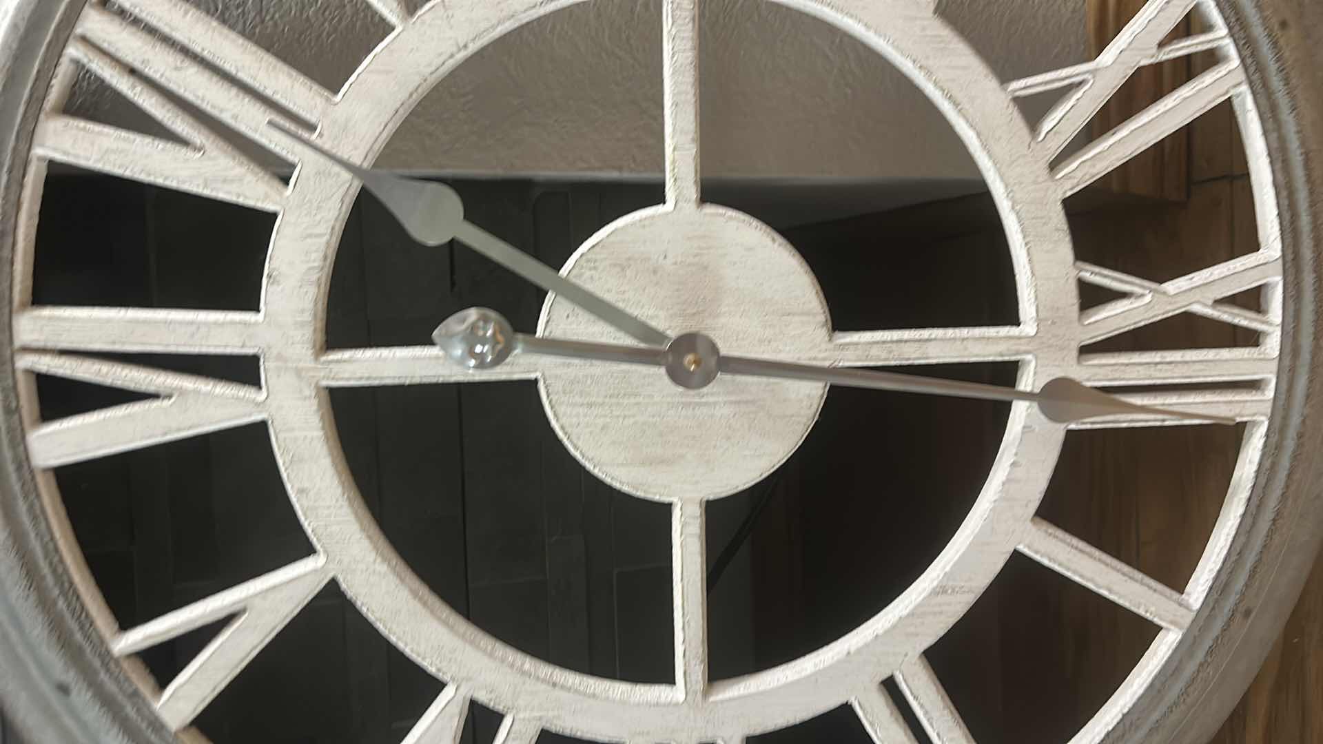 Photo 1 of DECORATIVE TIN WALL CLOCK 27”