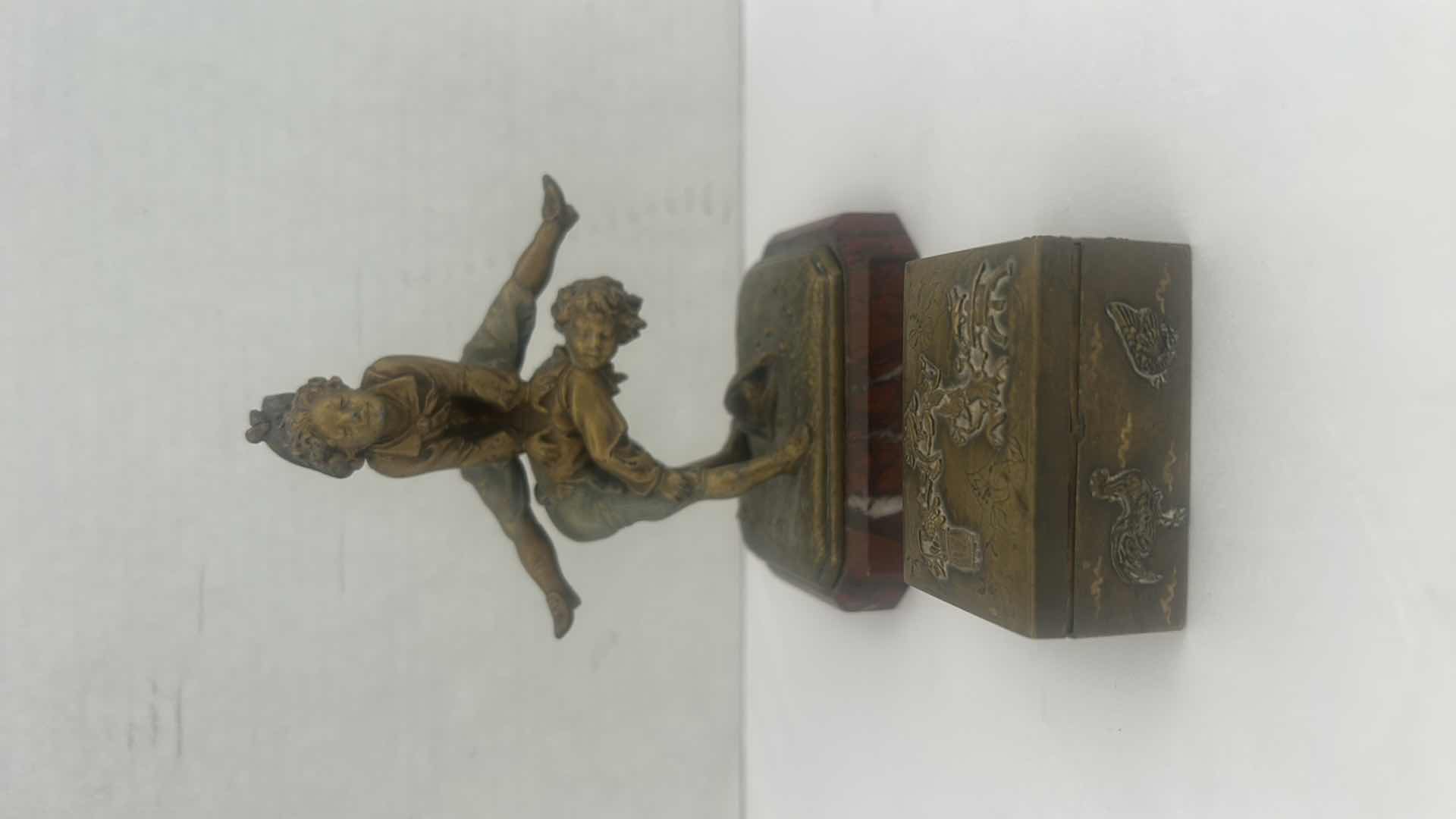 Photo 1 of 2 VINTAGE METAL PIECES- BOY AND GIRL PLAYING SCULPTURE ON MARBLE BASE H5.75” & SMALL CARVED METAL PILL BOX