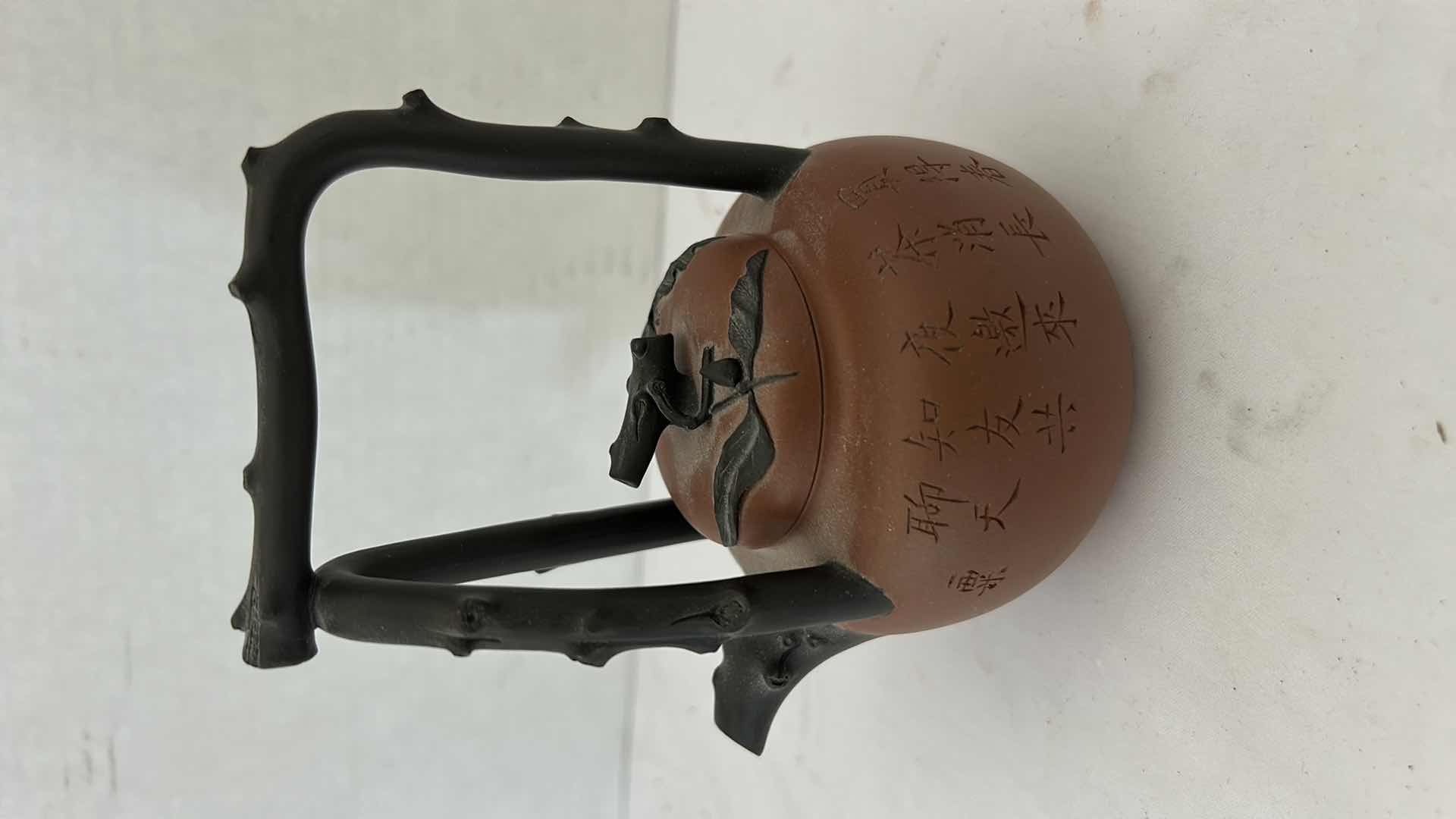 Photo 1 of ANTIQUE YIXING ZISHA TEAPOT, DATING BACK TO THE QING DYNASTY (The text on the teapot translates to "Invite friends over" ) H5.75”