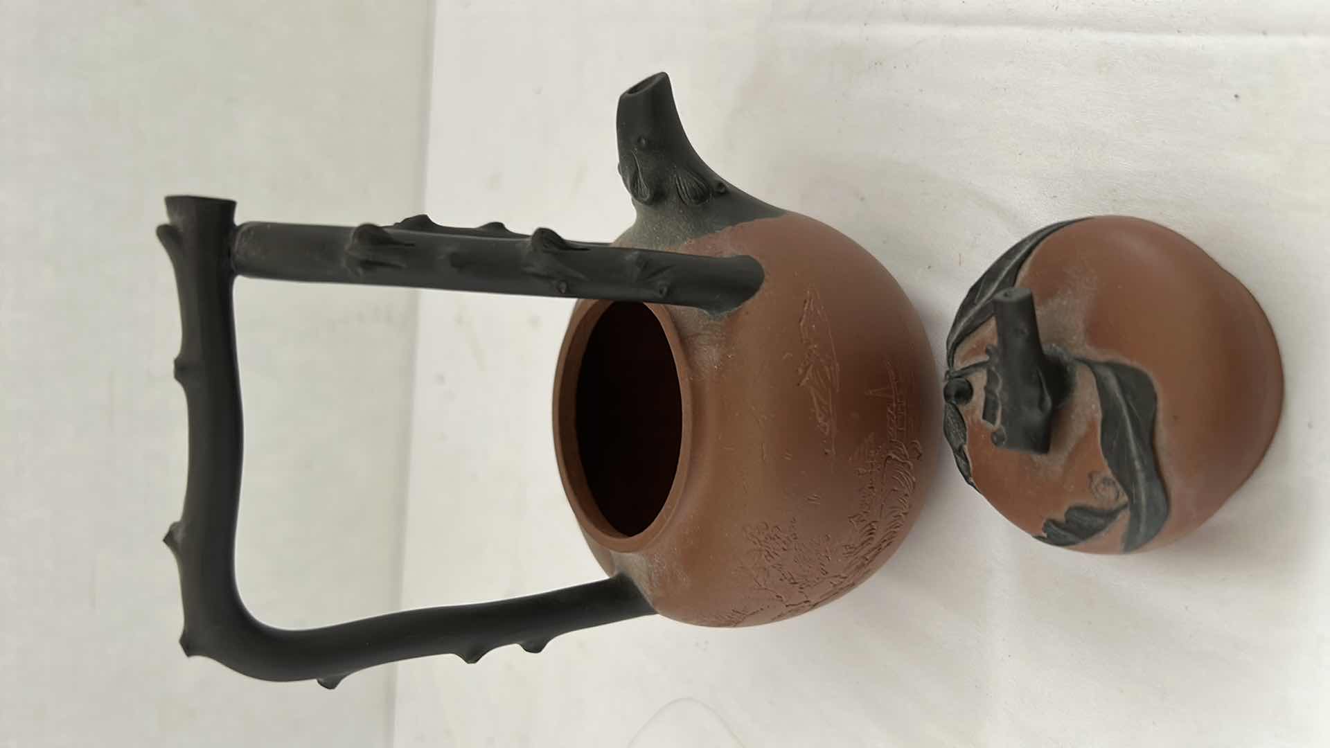 Photo 1 of ANTIQUE YIXING ZISHA TEAPOT, DATING BACK TO THE QING DYNASTY (The text on the teapot translates to "Invite friends over" ) H5.75”