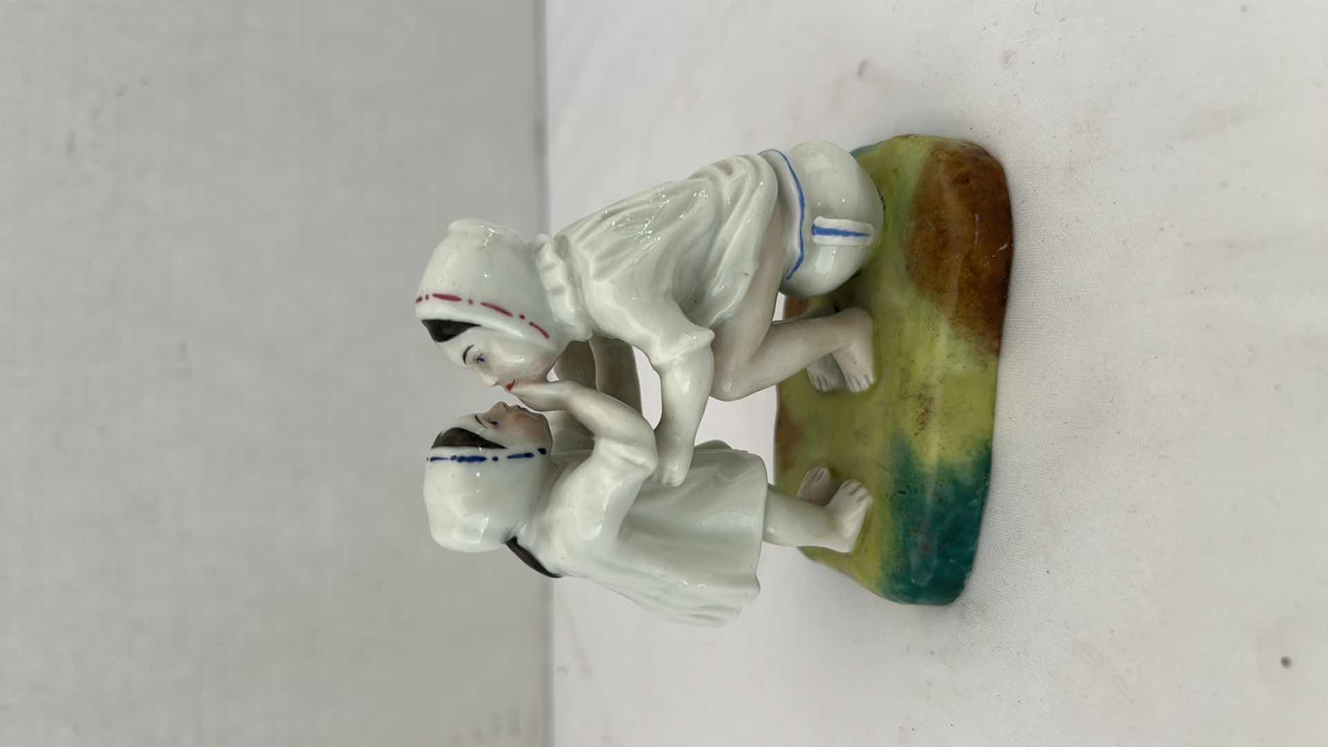Photo 1 of 3.5” PORCELAIN FIGURINE