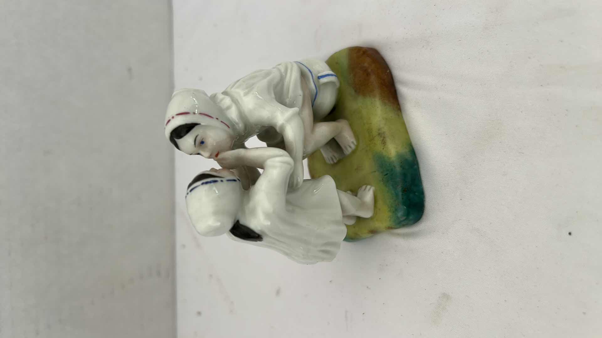 Photo 1 of 3.5” PORCELAIN FIGURINE