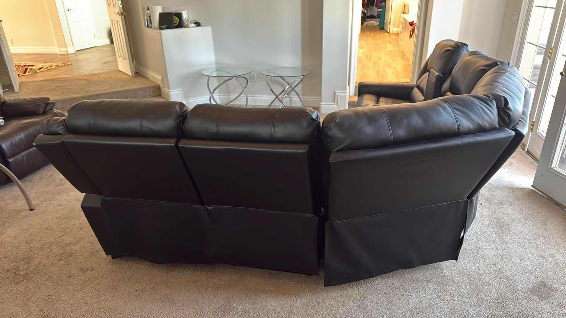 Photo 1 of BLACK VINYL RECLINING SECTIONAL SOFA 96” x 83” (3 PCS)