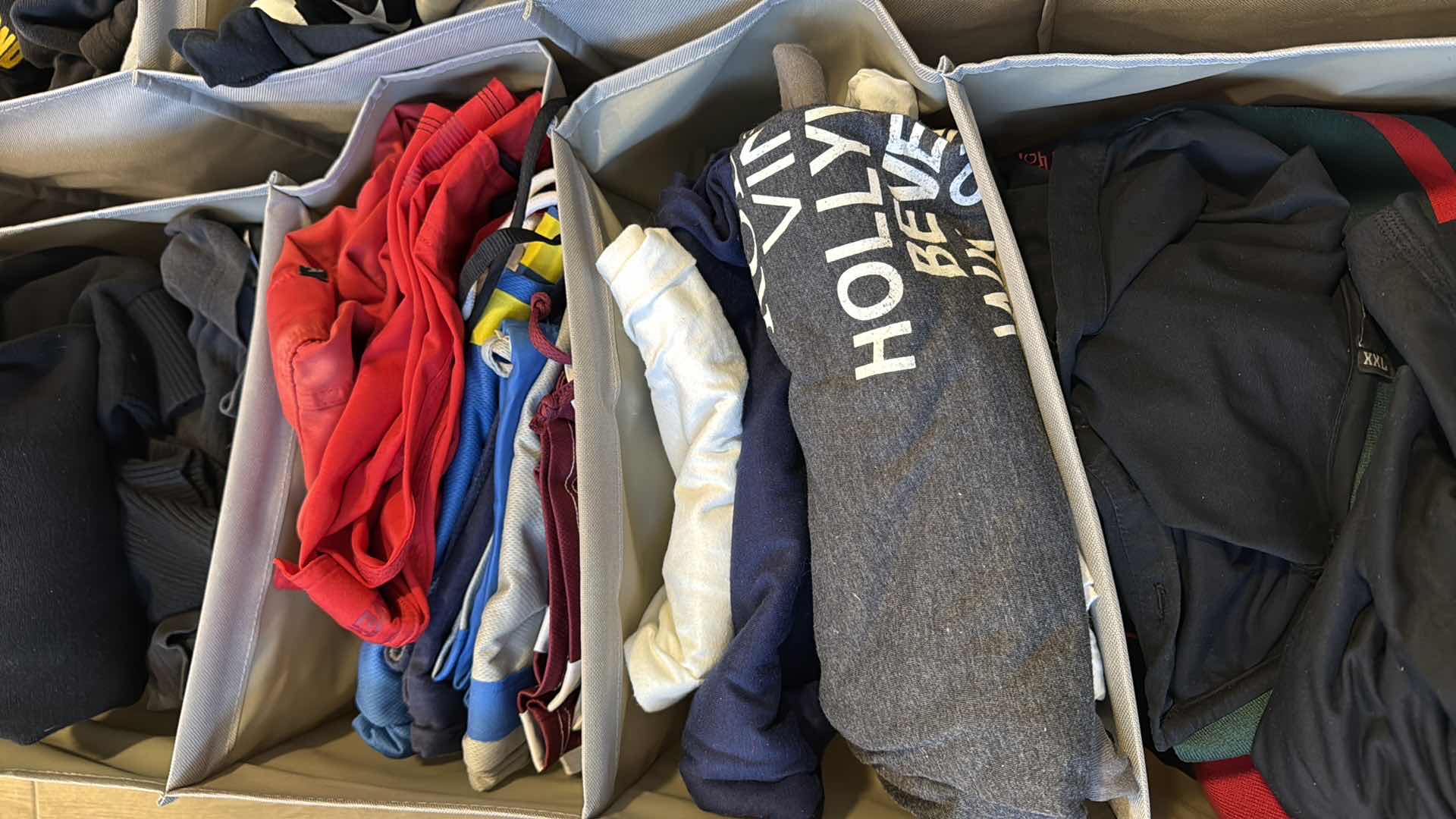 Photo 1 of CONTENTS OF STORAGE RACKS-MEN’S CLOTHES (SIZE L-XXL)