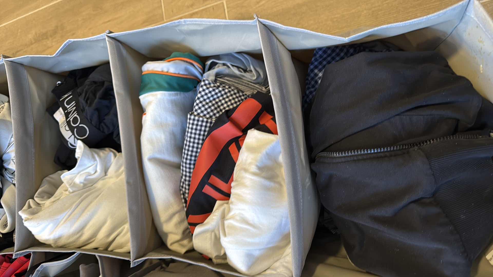 Photo 1 of CONTENTS OF STORAGE RACKS-MEN’S CLOTHES (SIZE L-XXL)