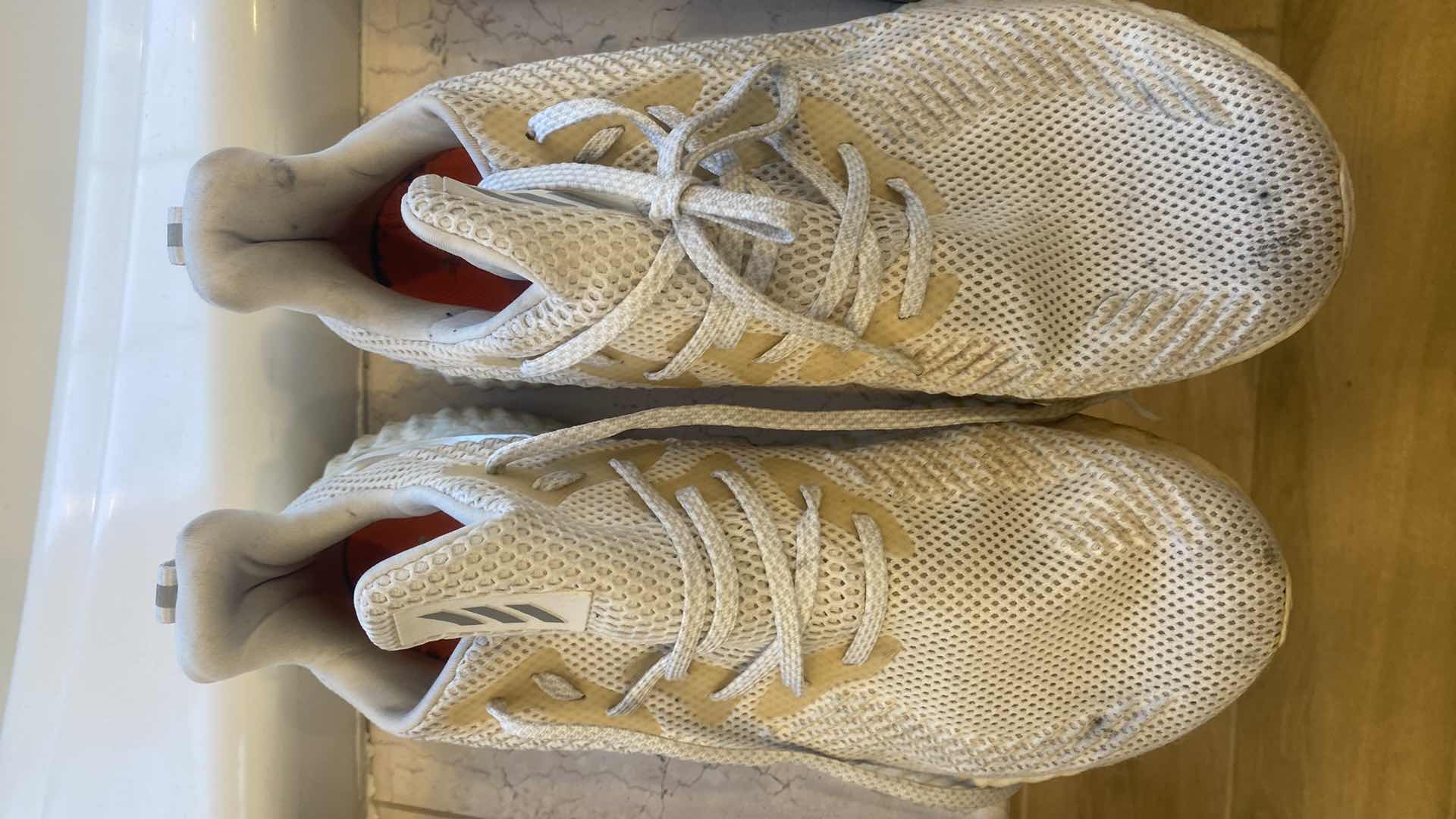 Photo 1 of MENS BOOST SIZE 10 SNEAKERS