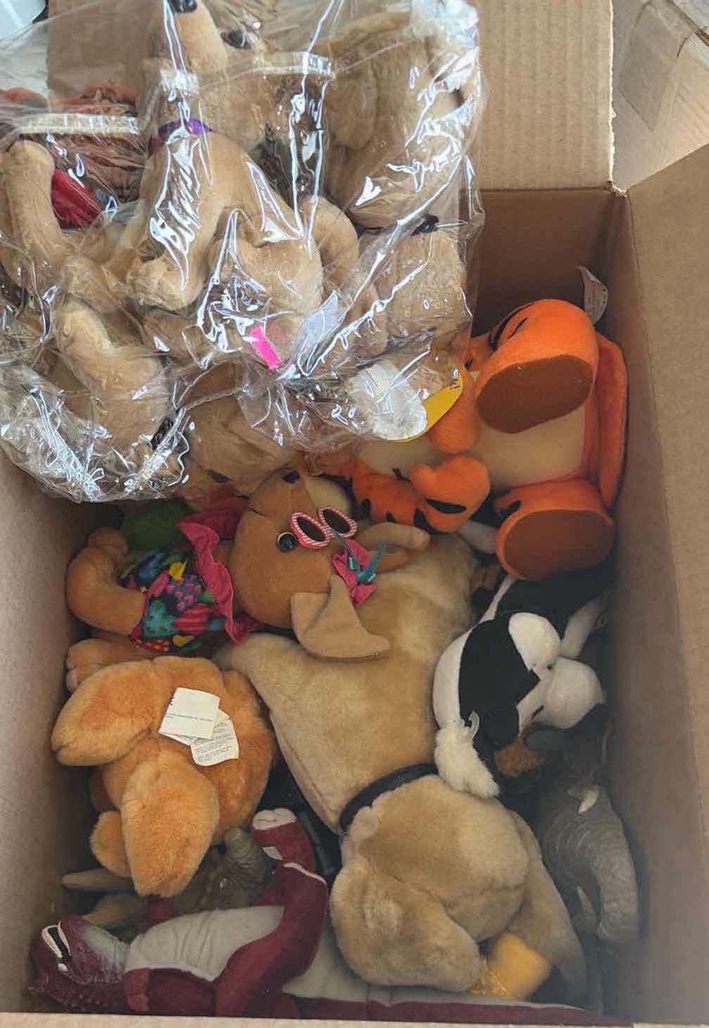 Photo 1 of CONTENTS OF BOX STUFFED ANIMALS/ DISNEY TACO BELL