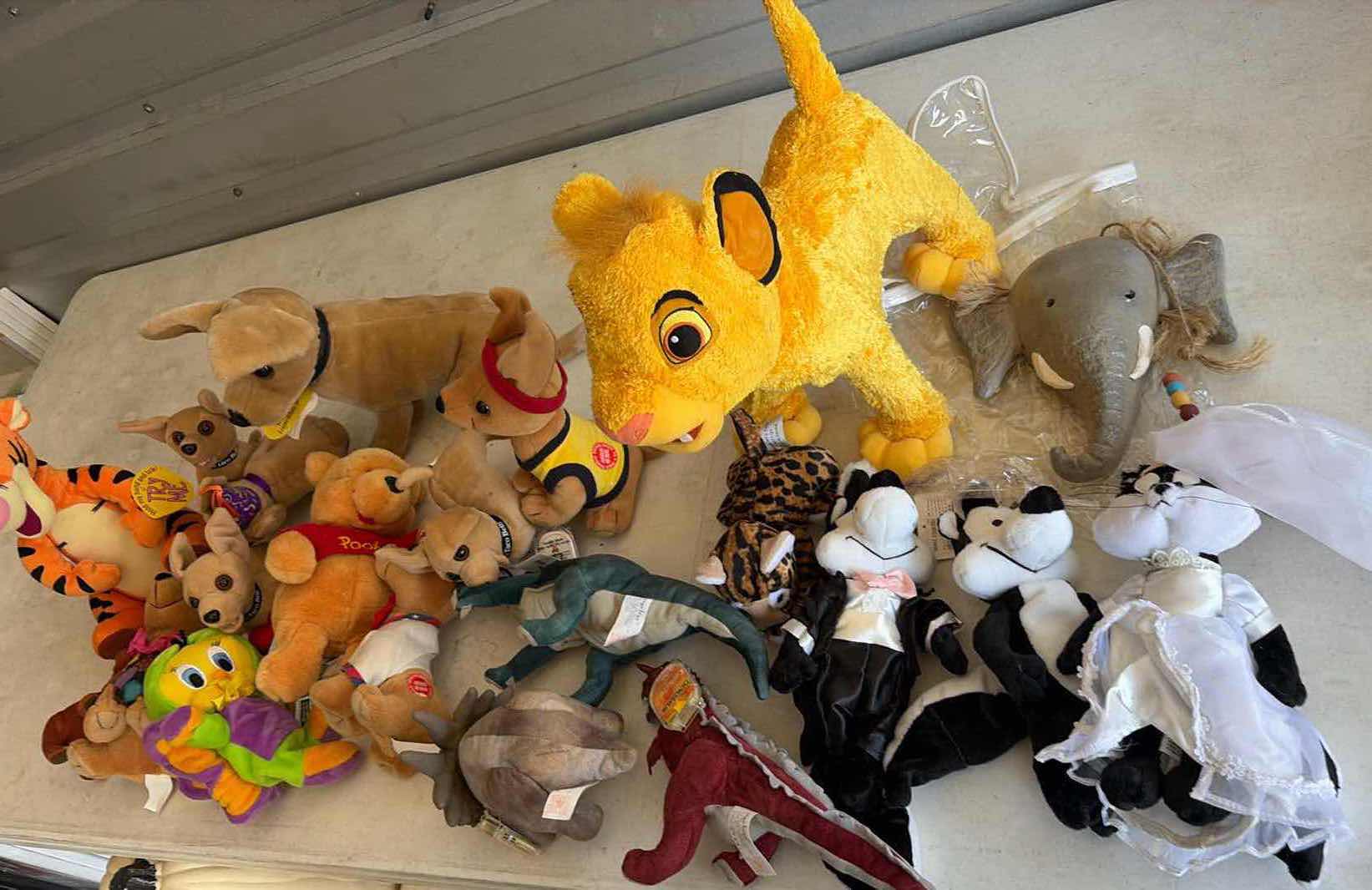 Photo 1 of CONTENTS OF BOX STUFFED ANIMALS/ DISNEY TACO BELL