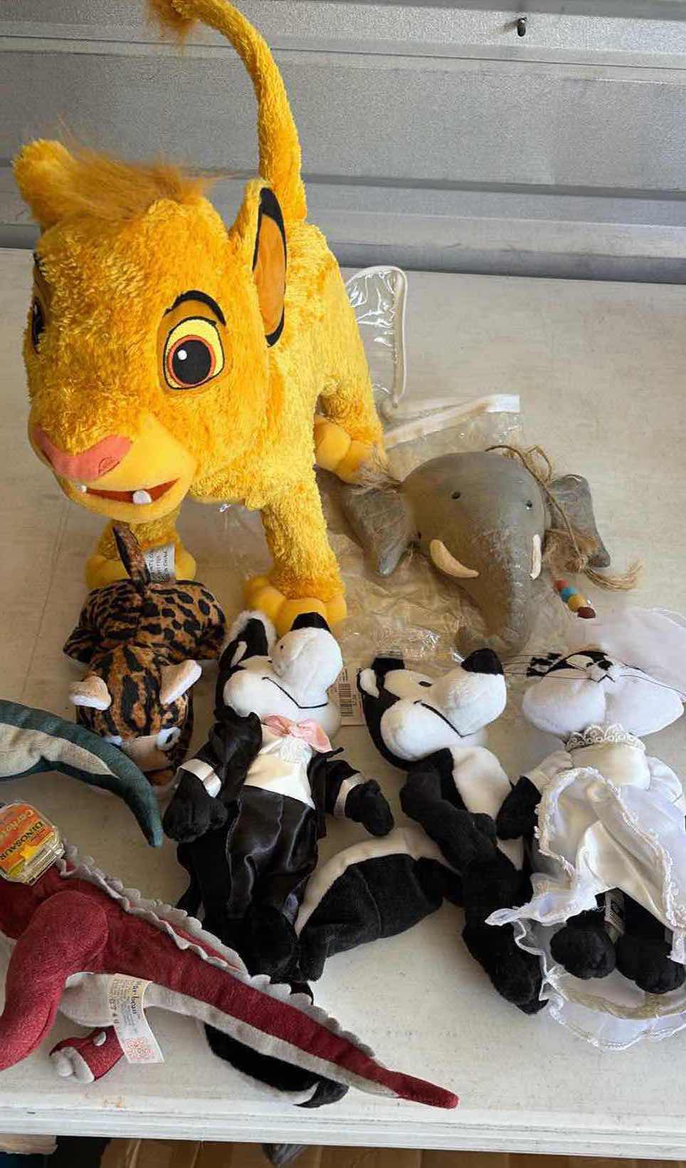 Photo 1 of CONTENTS OF BOX STUFFED ANIMALS/ DISNEY TACO BELL