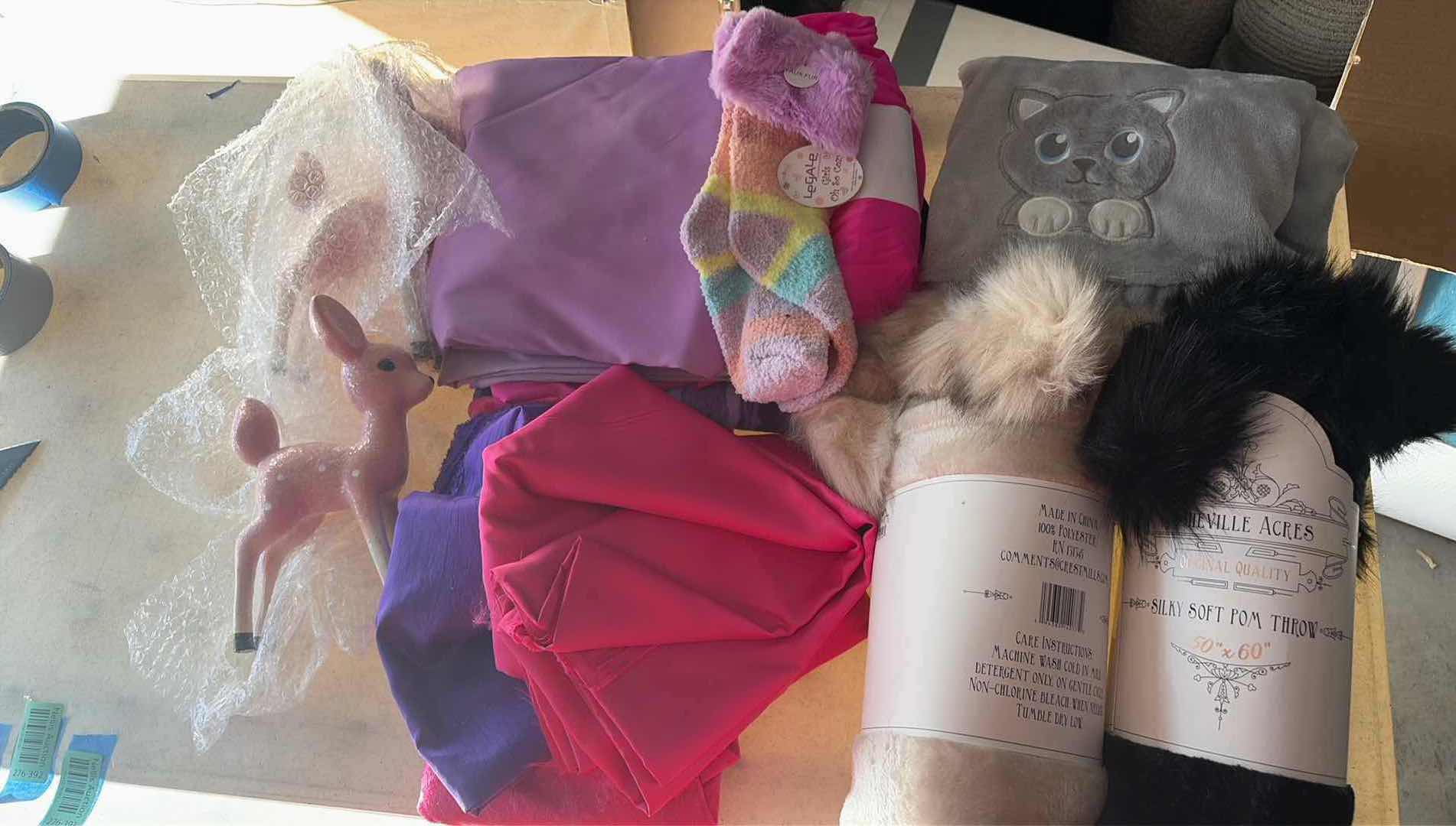 Photo 1 of CONTENTS OF BOX FABRIC/  THROW RUGS