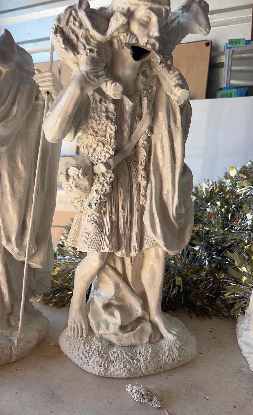 Photo 1 of CONTENTS OF TOTE- RELIGIOUS STATUES