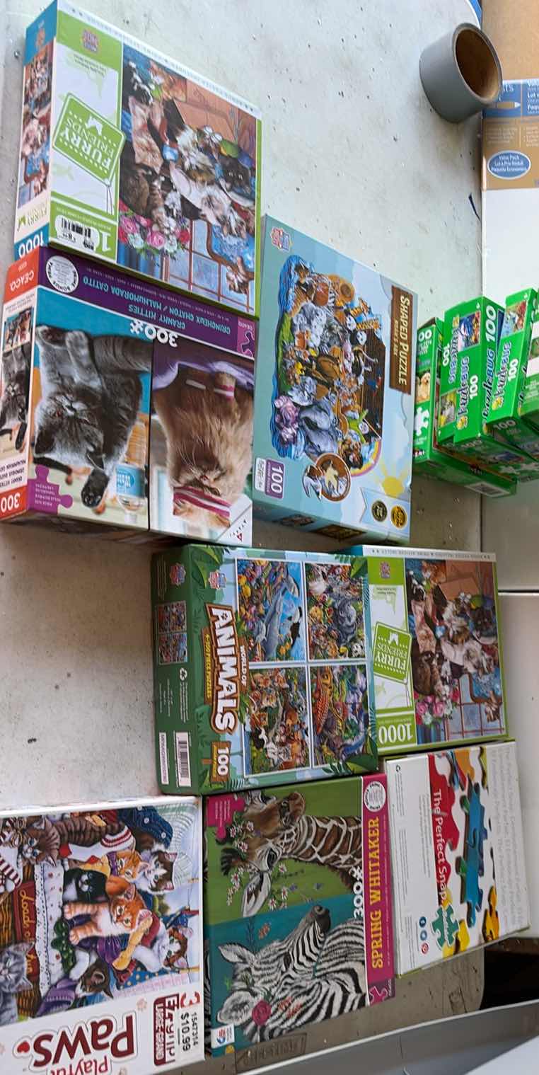 Photo 1 of CONTENTS OF BOX JIGSAW PUZZLES