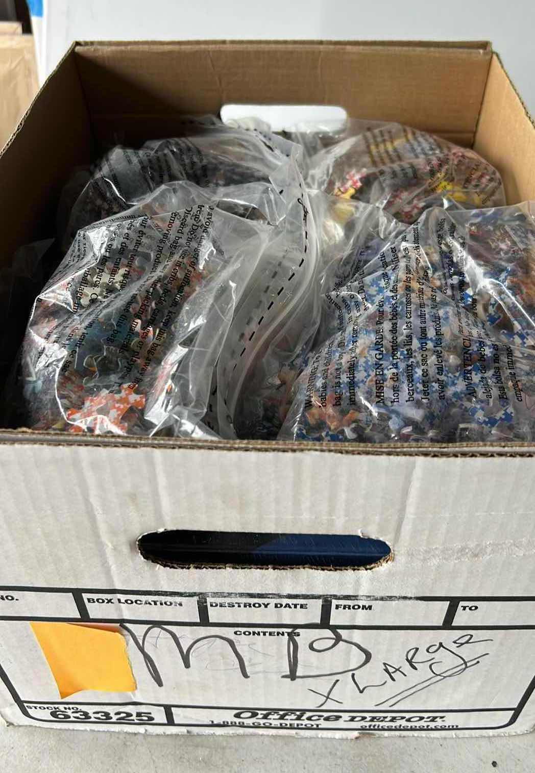 Photo 1 of BOX OF PUZZLES