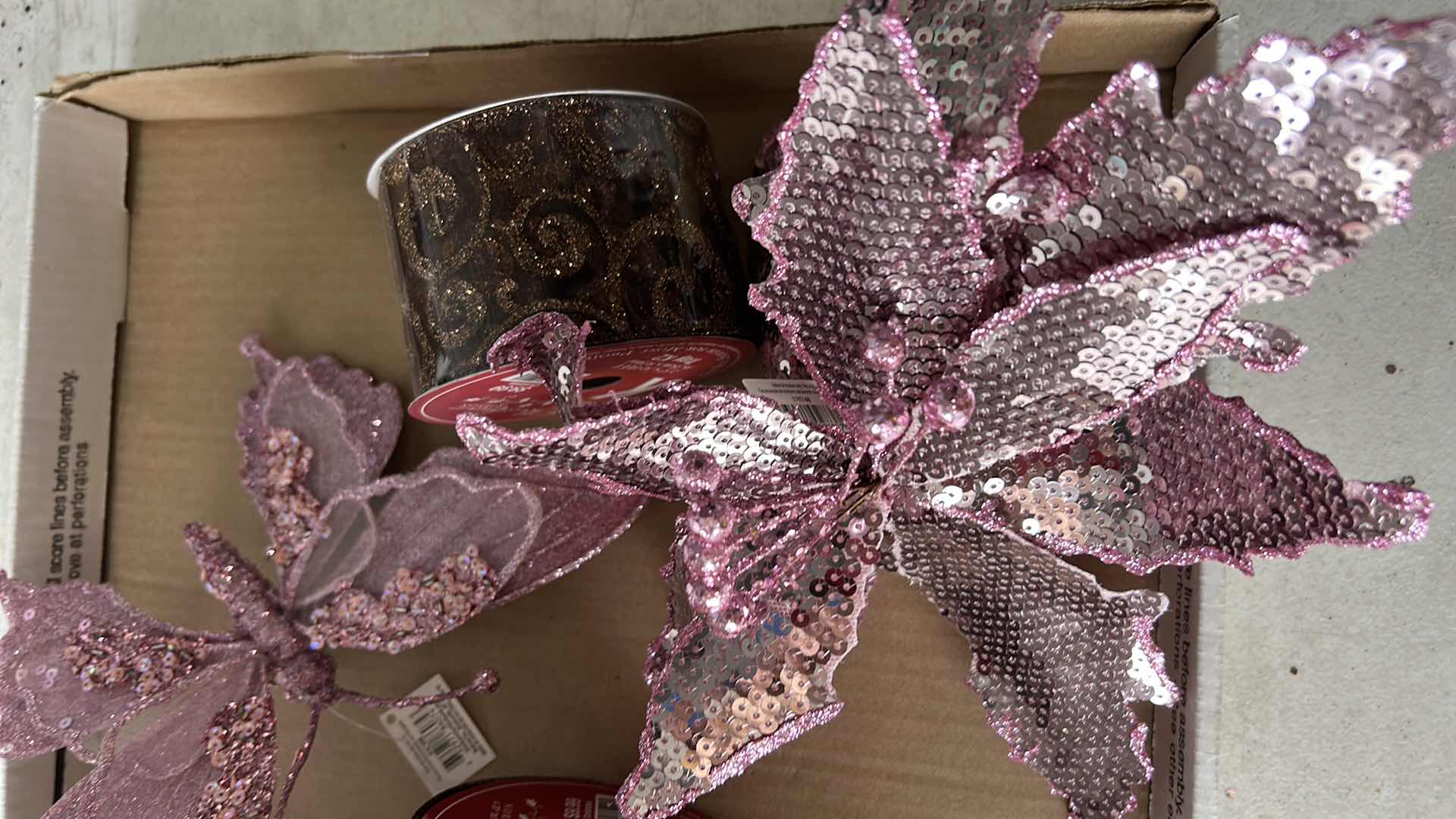 Photo 1 of BOX FULL OF PINK POINSETTIAS, BUTTERFLIES, AND RIBBON