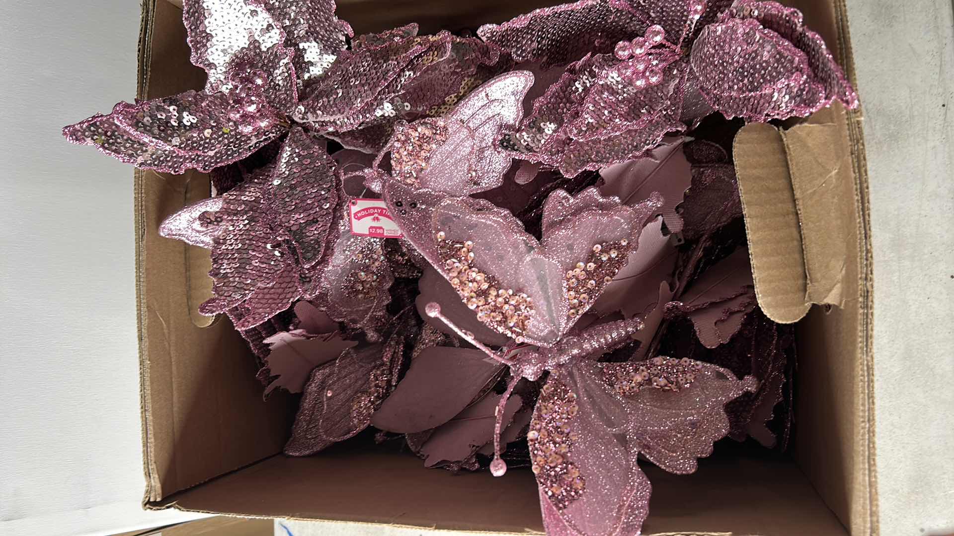 Photo 1 of BOX FULL OF PINK POINSETTIAS, BUTTERFLIES, AND RIBBON