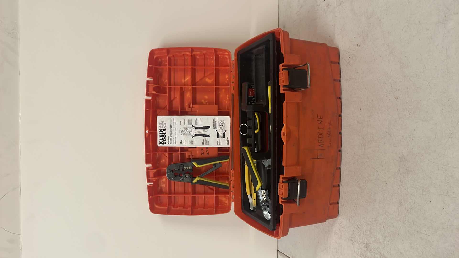 Photo 1 of KLEIN TOOLS RATCHETING CRIMPER/STRIPPER AND OTHER LOW VOLTAGE ITEMS IN HARD CARRYING CASE