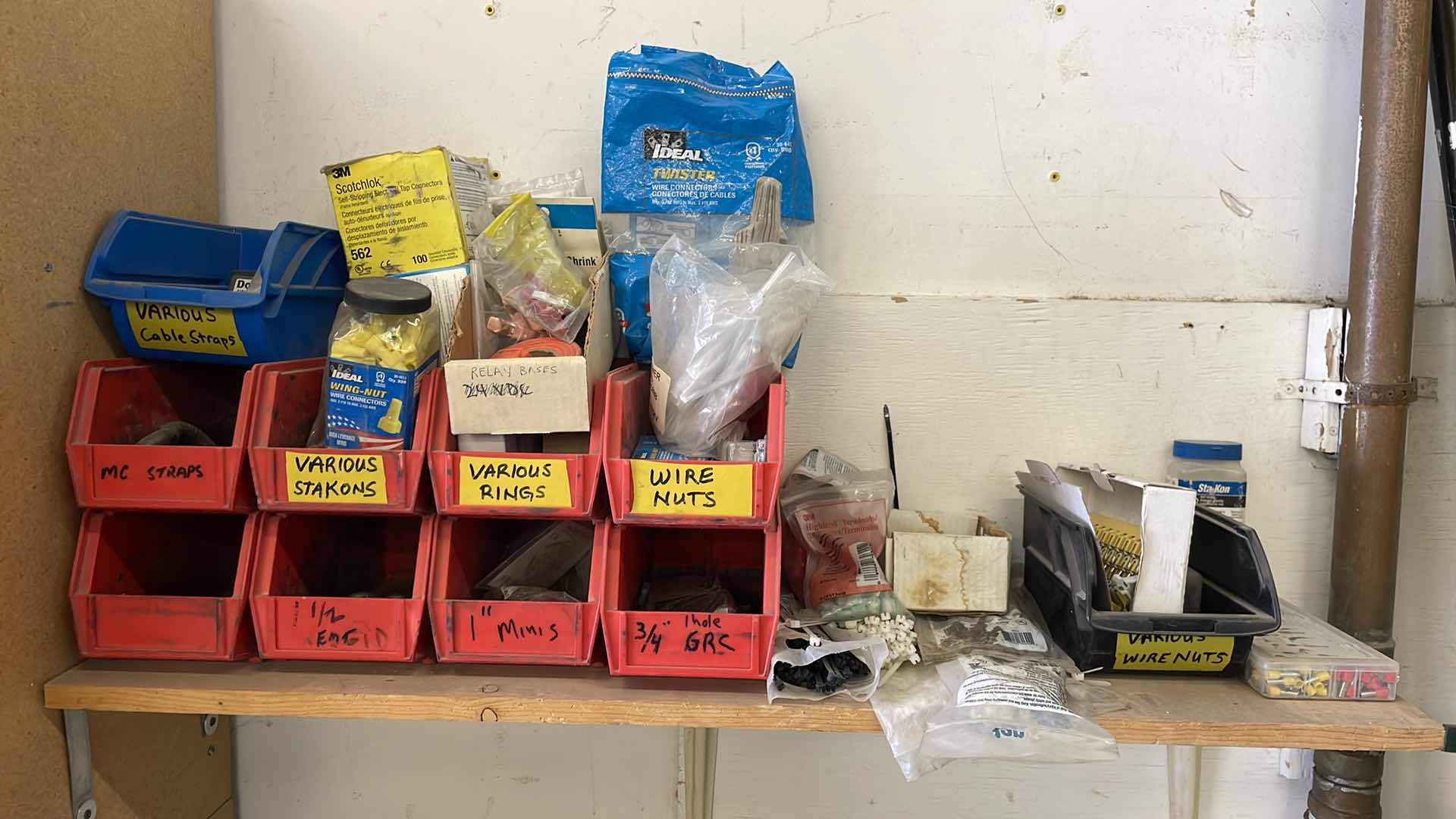 Photo 1 of CONTENT OF SHELF WIRE NUTS WIRE CONNECTORS ZIP TIES SHACKLES STORAGE BINS